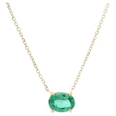 Pendentif solitaire réglable en or jaune 14 carats avec émeraude ovale de 0,70 carat