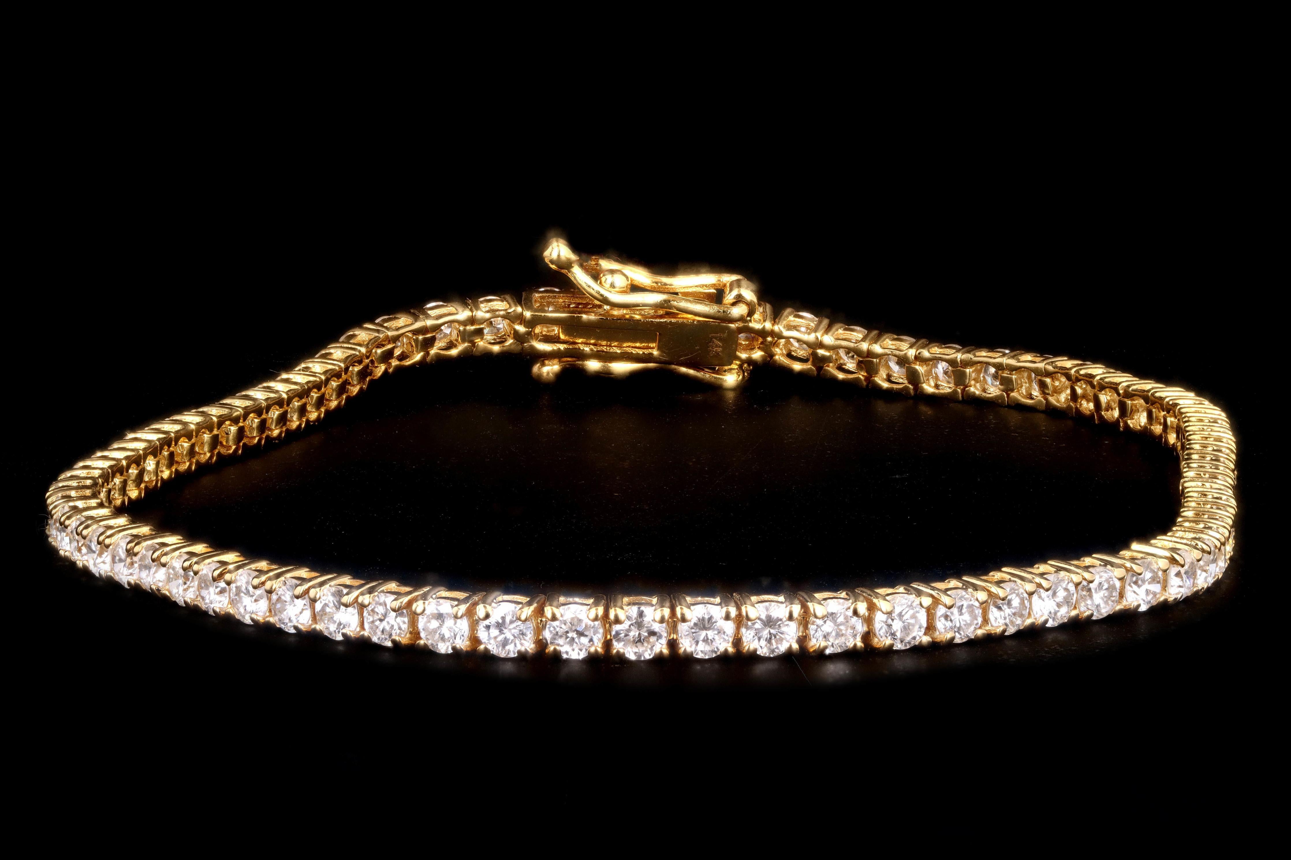 Era: New

Composition: 14K Yellow Gold

Primary Stone: Round Brilliant Cut Diamonds

Total Carat Weight: Approximately 5.93 Carats 

Color/Clarity: G-H / SI1-2

Bracelet Length: 8 Inches

Bracelet Weight: 8.3 Grams 