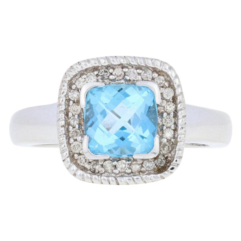 Ring mit 1,62 Karat blauem Topas und Diamant, Halo aus 14k Weißgold