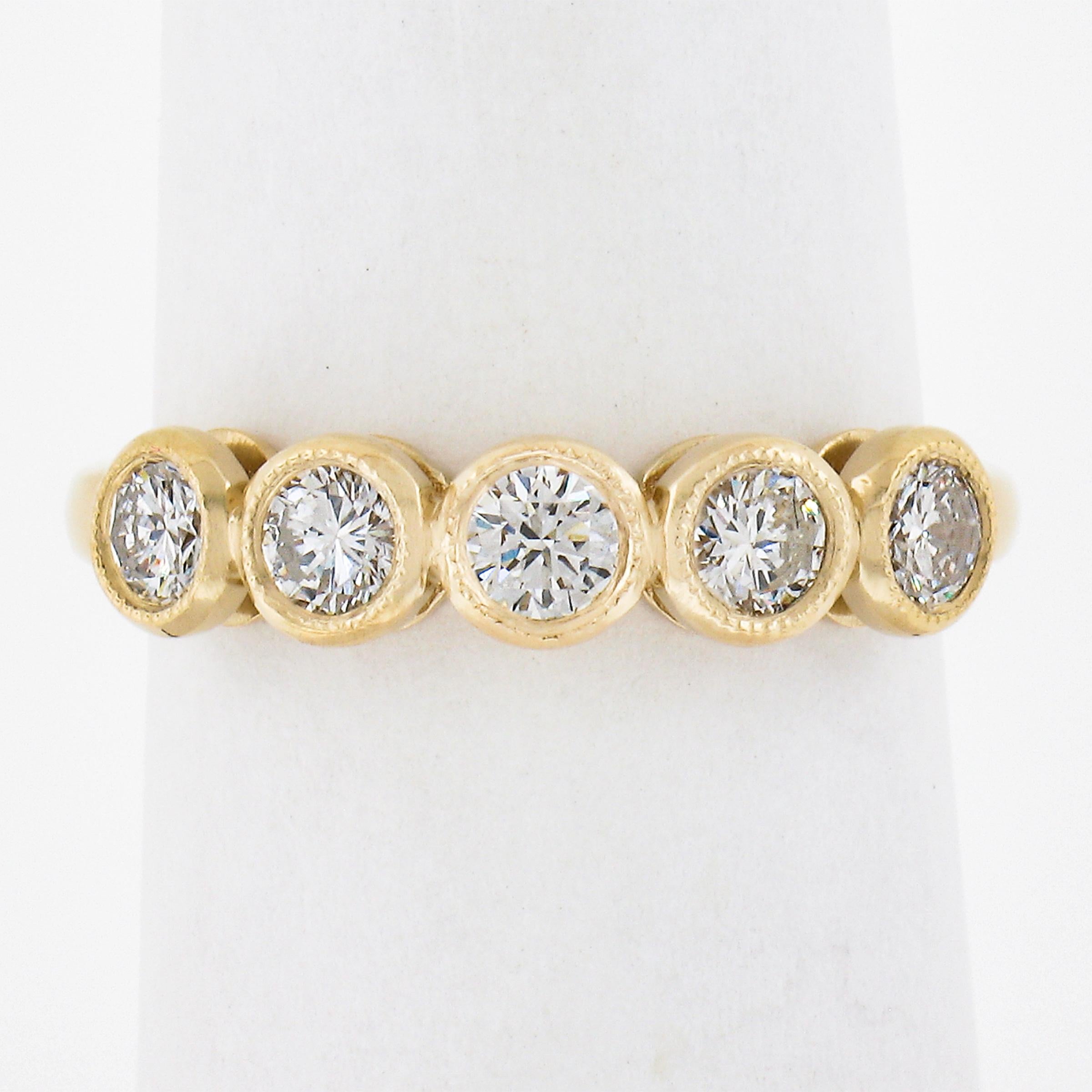 --Stone(s):--
(5) Natural Genuine Diamonds - Round Brilliant Cut - Milgrain Bezel Set - G/H Color - VS1/VS2 Clarity 
Total Carat Weight:	0.63 (exact)

Material: Solid 18k Yellow Gold
Weight: 3.45 Grams
Ring Size: 6.5 (Fitted on a finger. We can