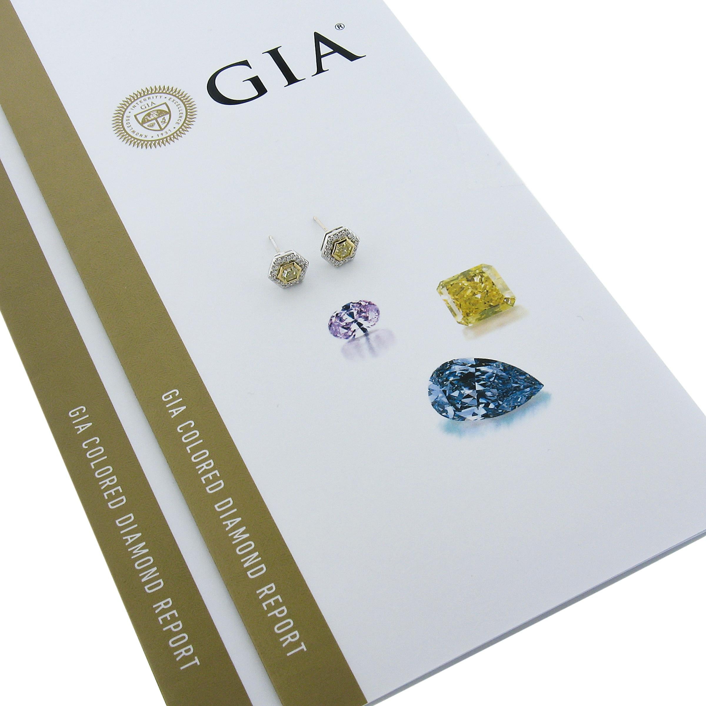 --Stone(s):--
(2) Natural Genuine Diamonds - Hexagonal Step Cut -  Bezel Set - Fancy Light Yellow Color - VVS2 Clarity - 0.64ctw (exact)
**See Certifications below**
(32) Natural Genuine Diamonds - Round Brilliant Cut -  Pave Set - F/G Color -