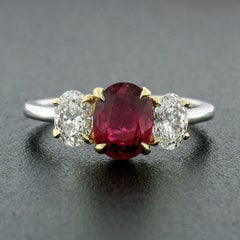 18 Karat Gold GIA Fine Vivid Red Oval Ruby and Diamond Three-Stone Ring
