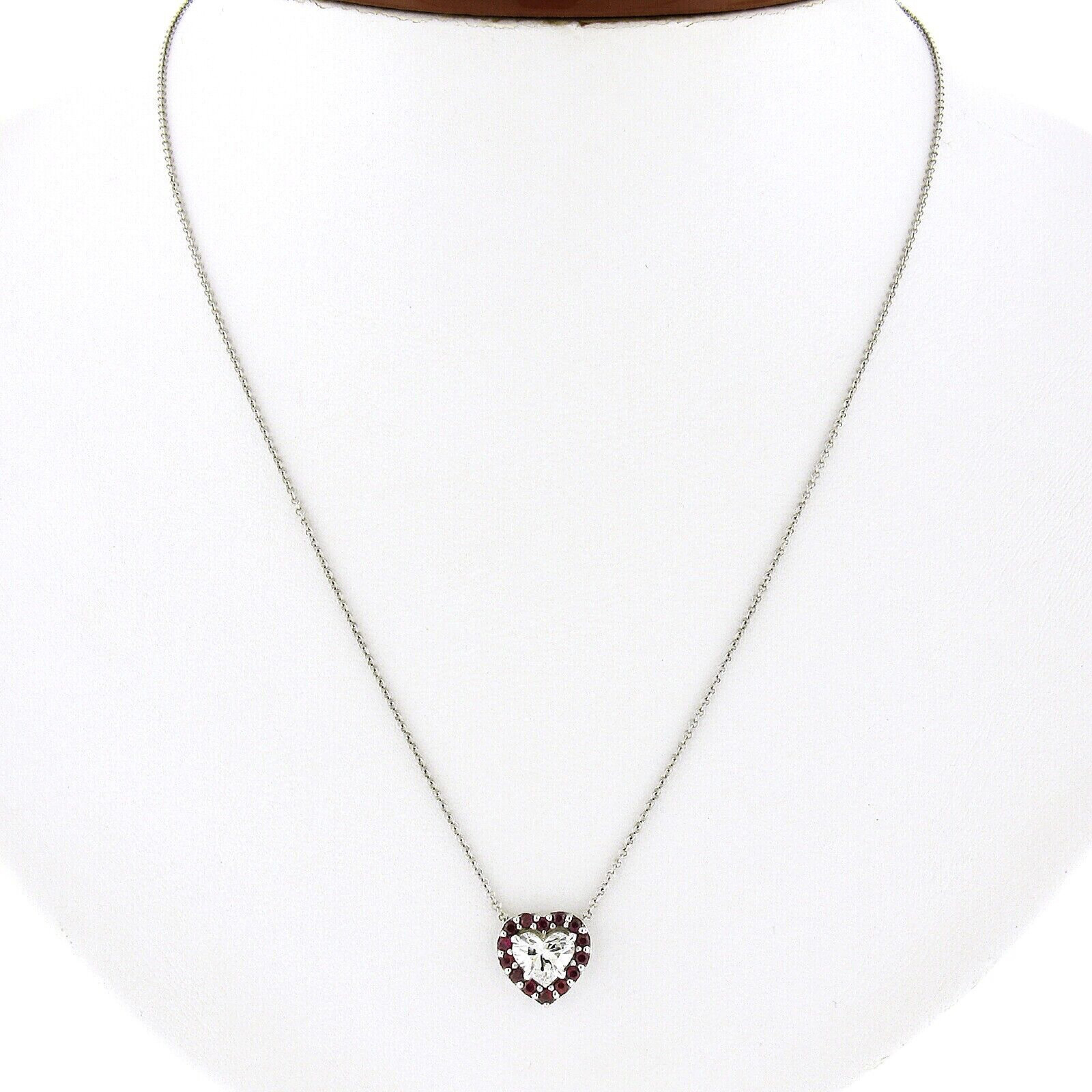 Here we have a gorgeous, brand new and custom made pendant necklace crafted in solid 18k white gold and features a lovely heart design constructed from a very fine, GIA certified, heart brilliant cut diamond solitaire neatly set at the center in