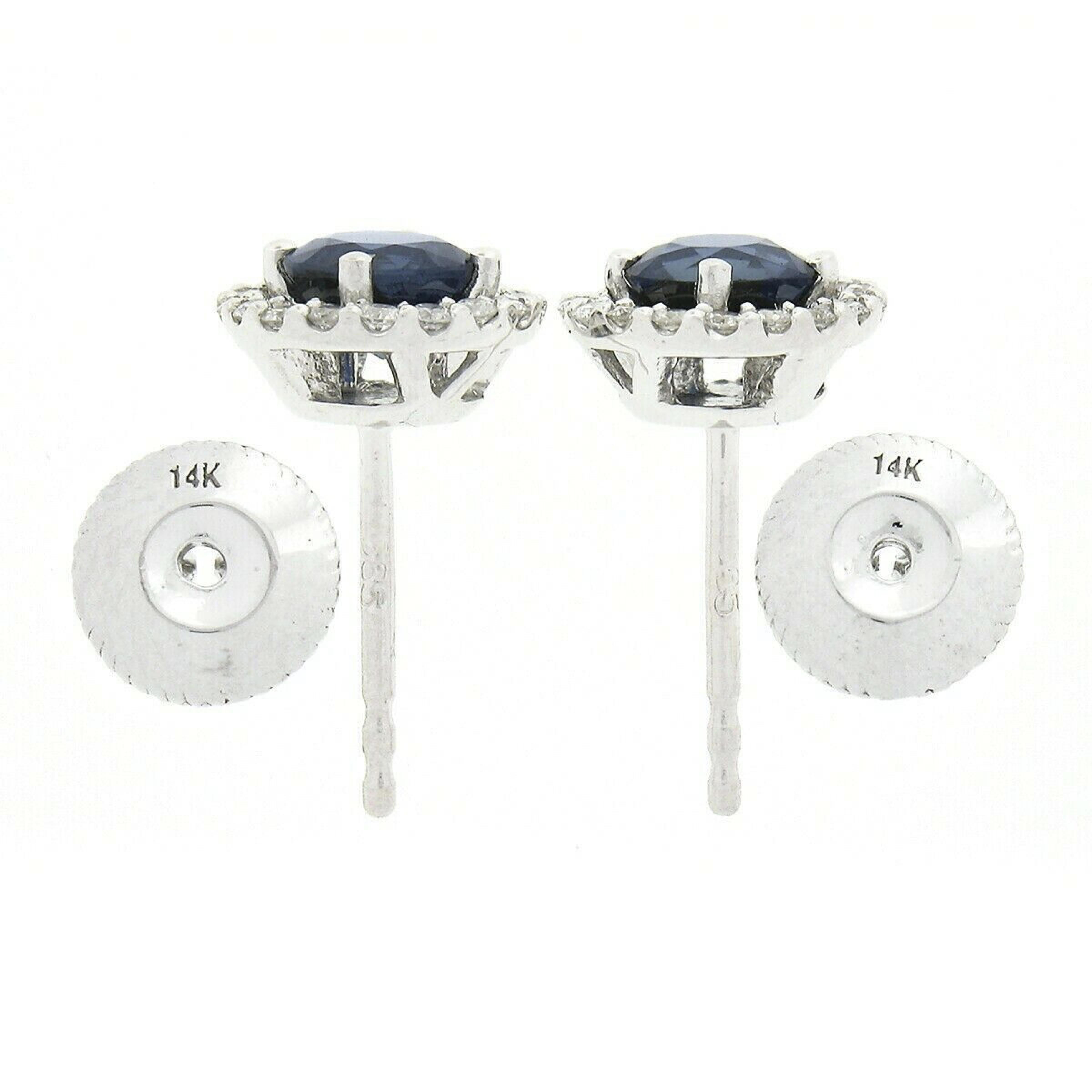 New 18k White Gold 1.86ct Round Royal Blue Sapphire & Diamond Halo Stud Earrings In New Condition For Sale In Montclair, NJ