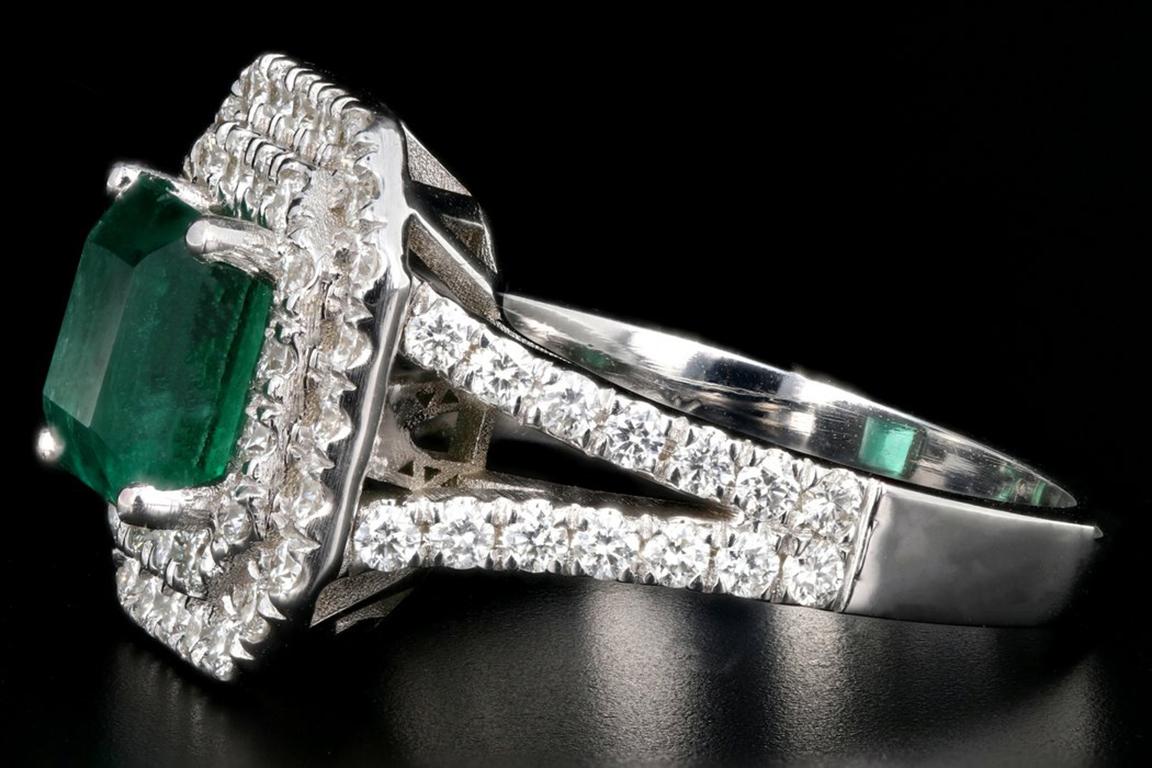 New 18k white gold 2.15 carat zambian emerald and diamond ring

Era: New
Composition: 18K white gold
Primary stone: Zambian emerald
Carat weight: 2.15 carats
Secondary stone: Round brilliant diamonds
Carat weight: Approximately 1.02 carats
Color: