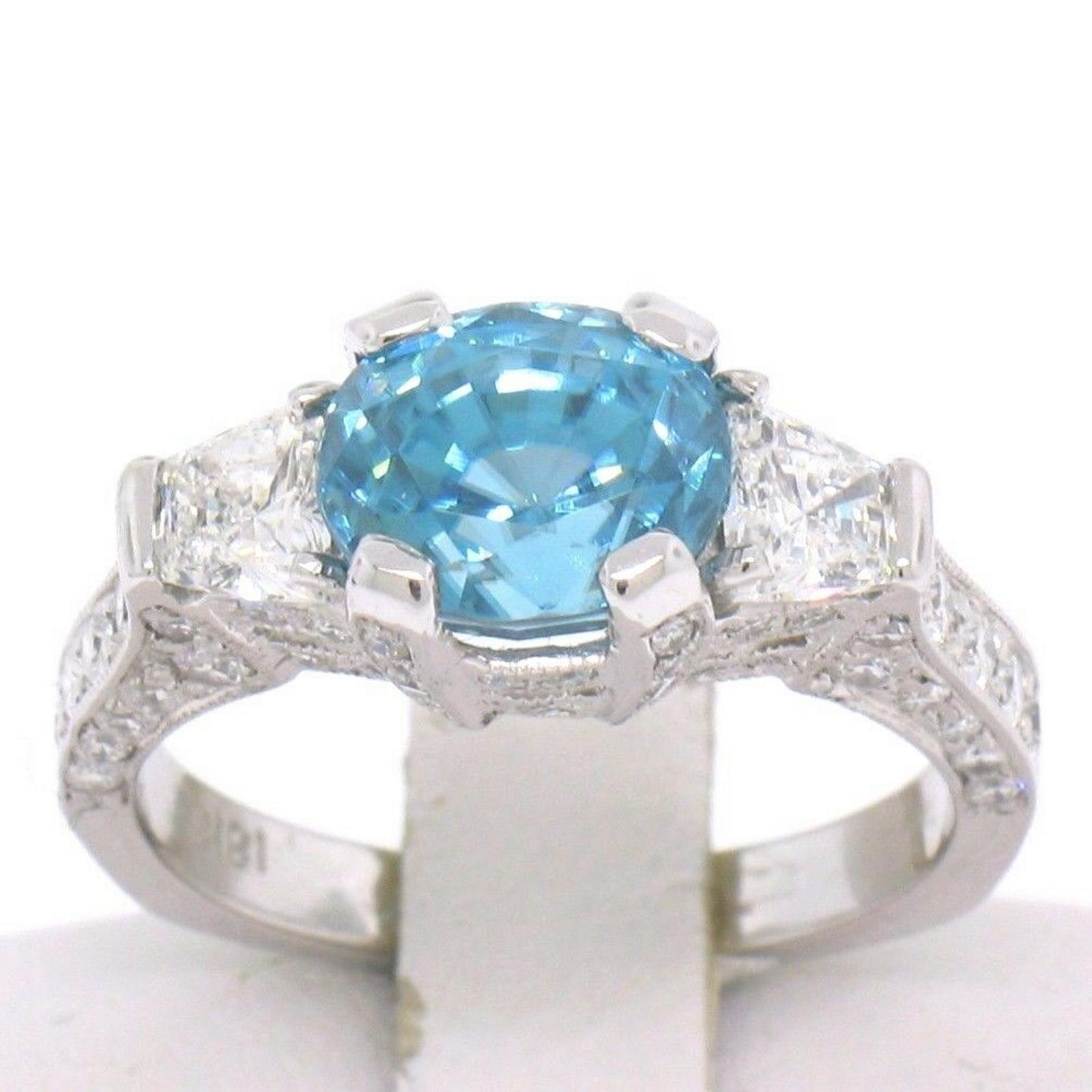 Oval Cut 18k White Gold 2.50ct Oval Brilliant Blue Zircon & Trapezoid Diamond Ring For Sale