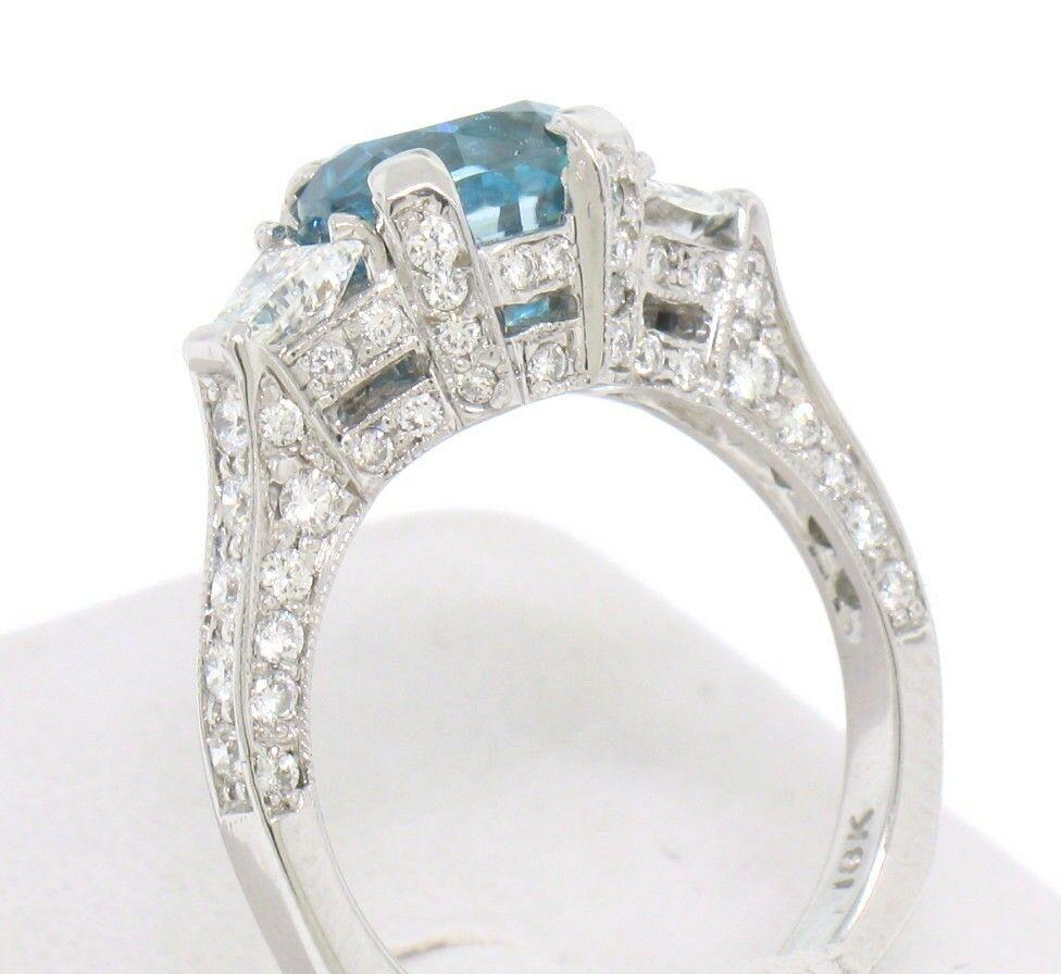18k White Gold 2.50ct Oval Brilliant Blue Zircon & Trapezoid Diamond Ring For Sale 1