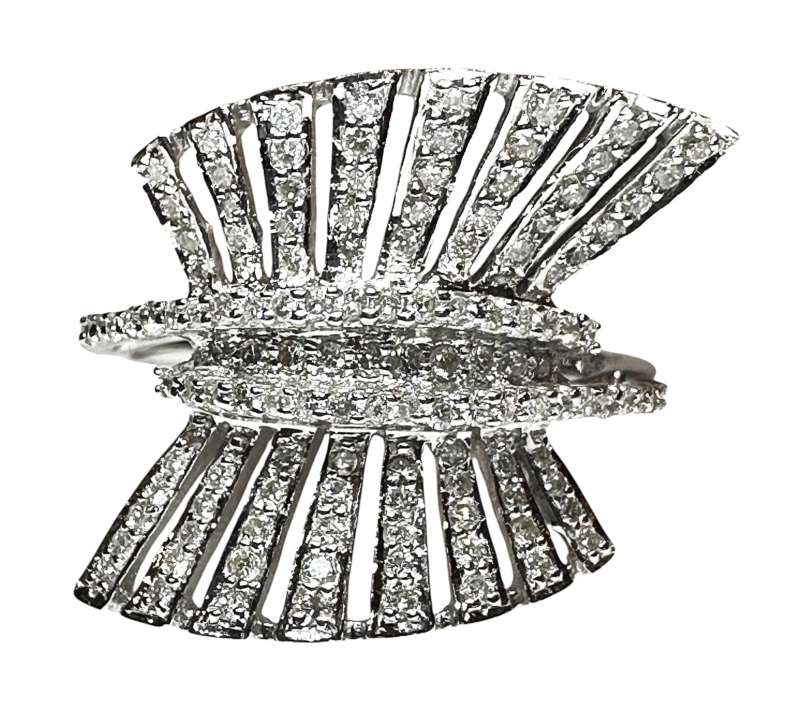 I can't even tell you how unique and glamorous this ring is!!  This is just a beautiful ring and a fabulous design.  The mounting is stamped 