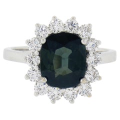 Bague neuve en or blanc 18 carats avec saphir vert coussin et halo de diamants de 3,22 carats certifiés GIA