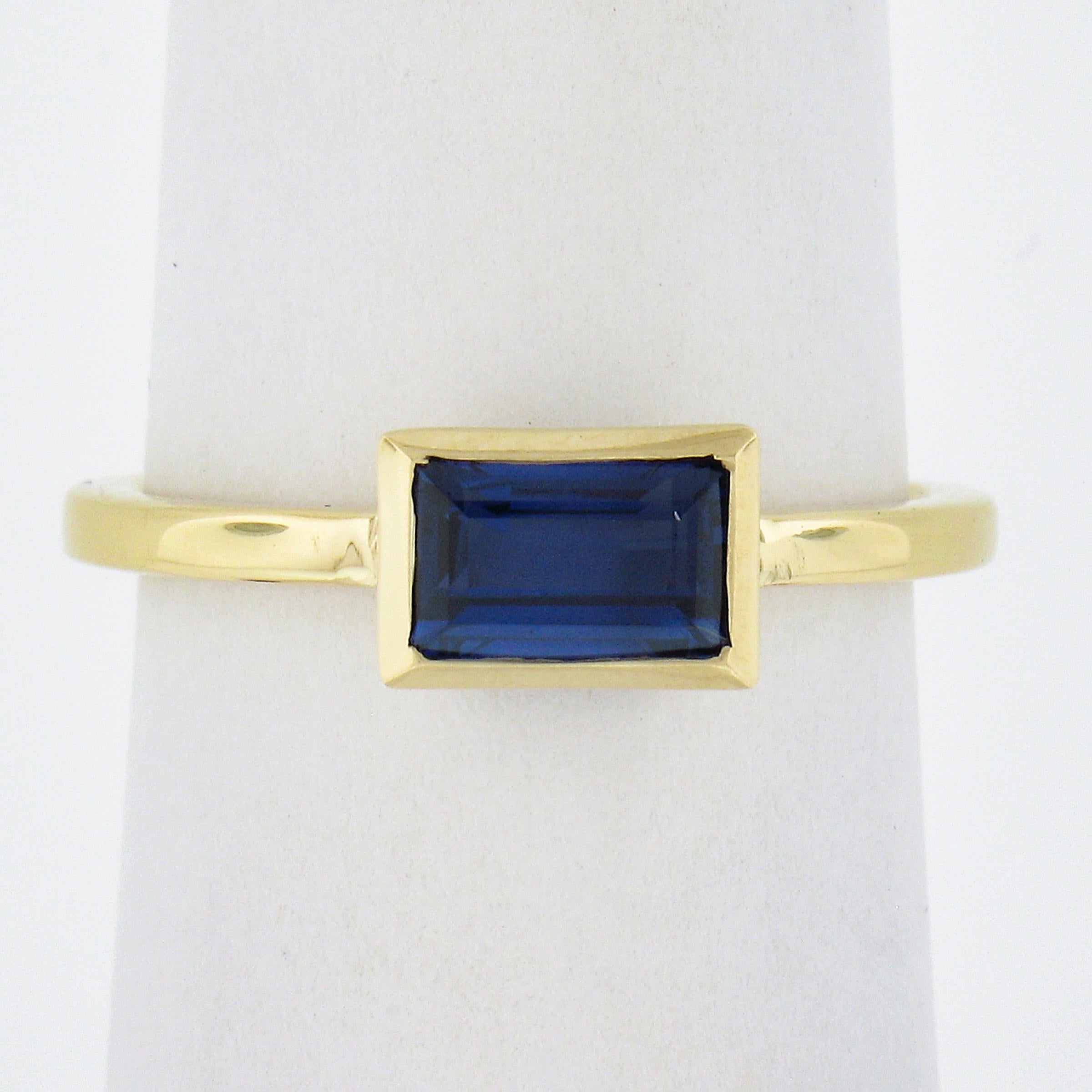 --Stone(s):--
(1) Natural Genuine Sapphire - Elongated Rectangular Step Cut - Bezel Set - Blue Color - 1.05ct (exact - certified) - VERY NICE CLEAN COLOR - NO HEAT
** See Certification Details Below for Complete Info **

Material: Solid 18k Yellow