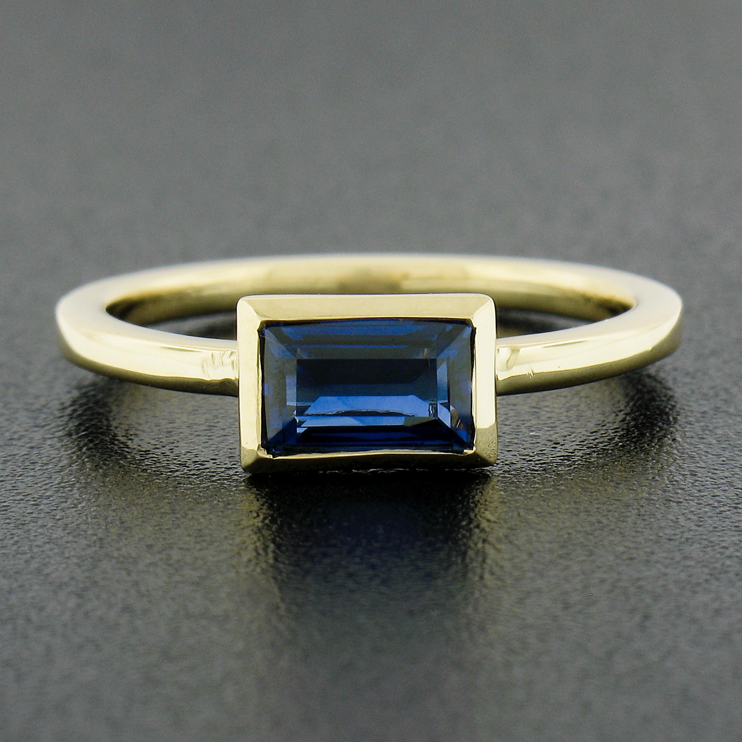 Emerald Cut New 18k Yellow Gold 1.05ct GIA No Heat Sapphire Sideway Bezel Solitaire Ring For Sale