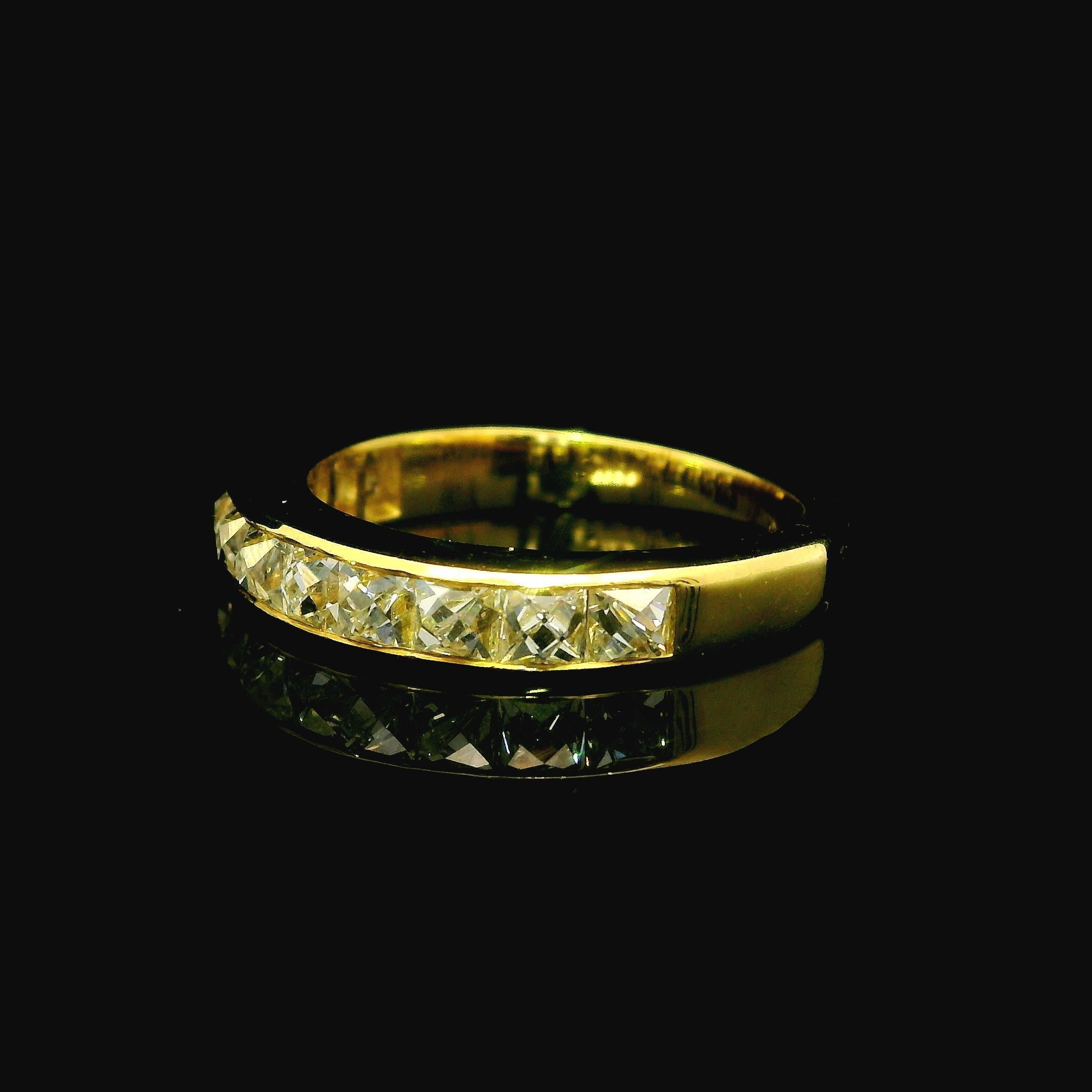 –Stone(s)–
(11) Natural Genuine Diamond - French Cut - Channel Set - H/I Color - VS1/VS2 Clarity - 2ctw (exact)

Material: Solid 18k Yellow Gold
Weight: 4.66 Grams
Ring Size: 7.0 ( fitted on finger, we can custom size this ring. please contact us