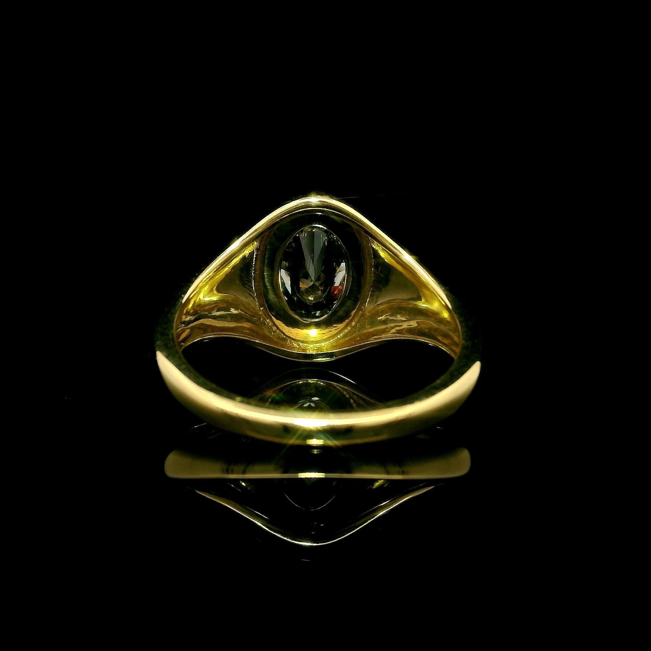 --Stone(s):--
(1) Natural Genuine Diamond - Oval Cut - Bezel Set - Laser Etched Cross on Table - L Color - VS2 Clarity - 1.01ct (exact - certified) 
** See Certification Details Below for Complete Info **

Material: Solid 18k Yellow Gold
Weight: