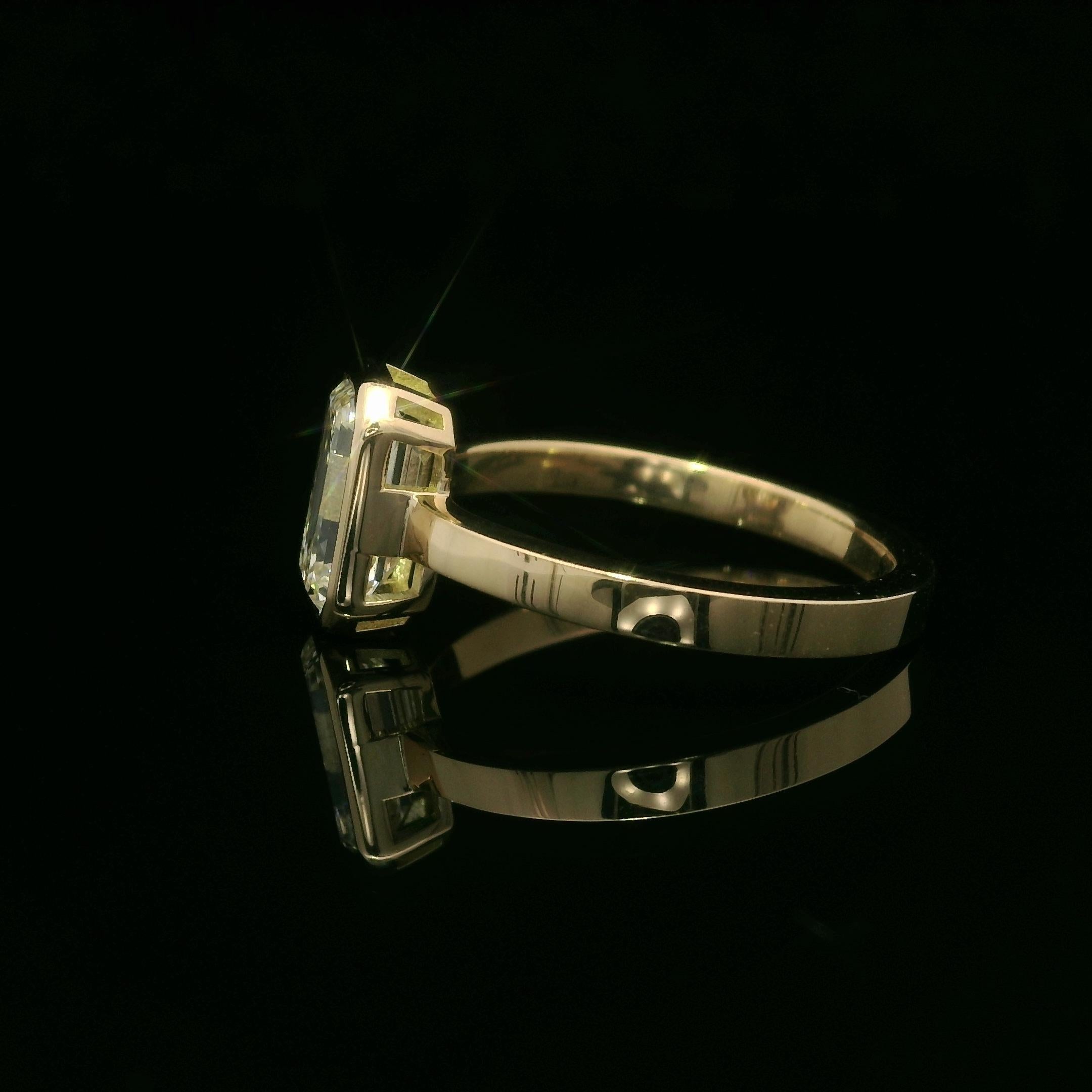 Women's New 18k Yellow Gold GIA 1.50ct Bezel Long Emerald Cut Diamond Solitaire Ring For Sale