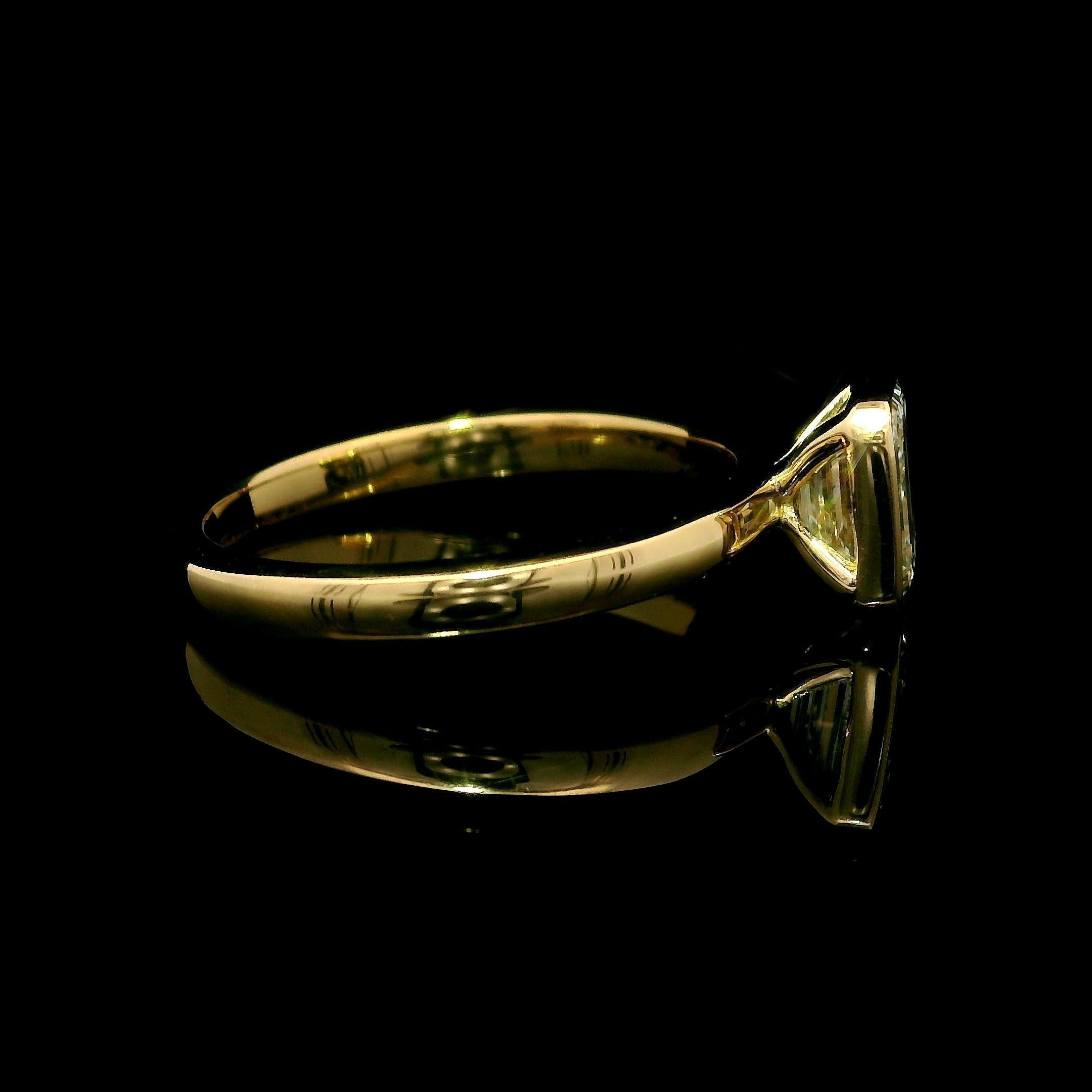 --Stone(s):--
(1) Natural Genuine Diamond - Emerald Cut - Bezel Set - L Color - VS1 Clarity - 1.00ct (exact - certified)
** See Certification Details Below for Complete Info **

Material: Solid 18k Yellow Gold
Weight: 3.39 Grams
Ring Size: 6.5