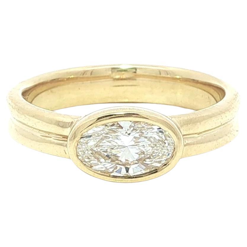 New 18k Yellow Gold GIA D VVS2 0.79ct Oval Diamond East West Bezel Band Ring