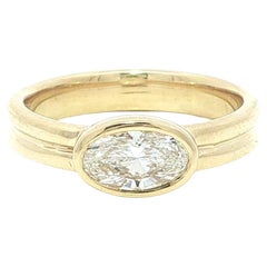 New 18k Yellow Gold GIA D VVS2 0.79ct Oval Diamond East West Bezel Band Ring