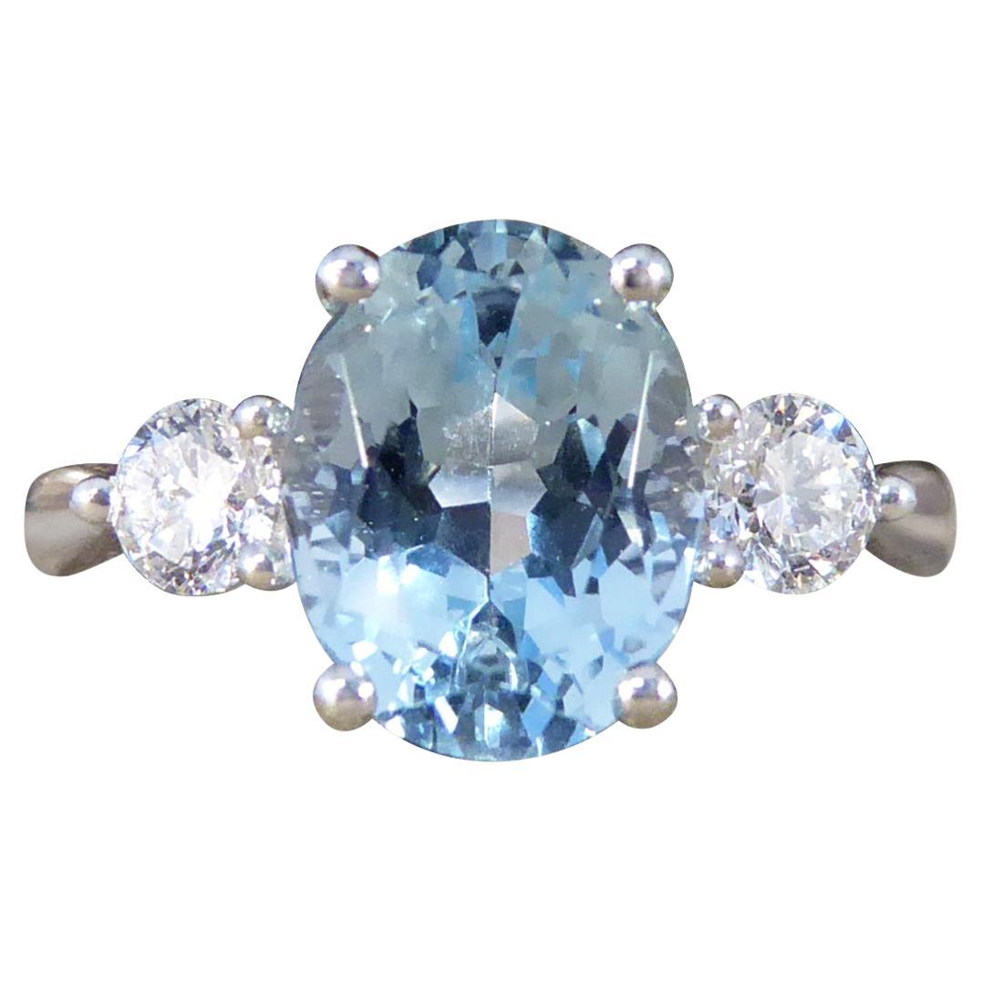 New 1.93 Carat Oval Cut Aquamarine and Diamond Three Stone Ring in Platinum For Sale