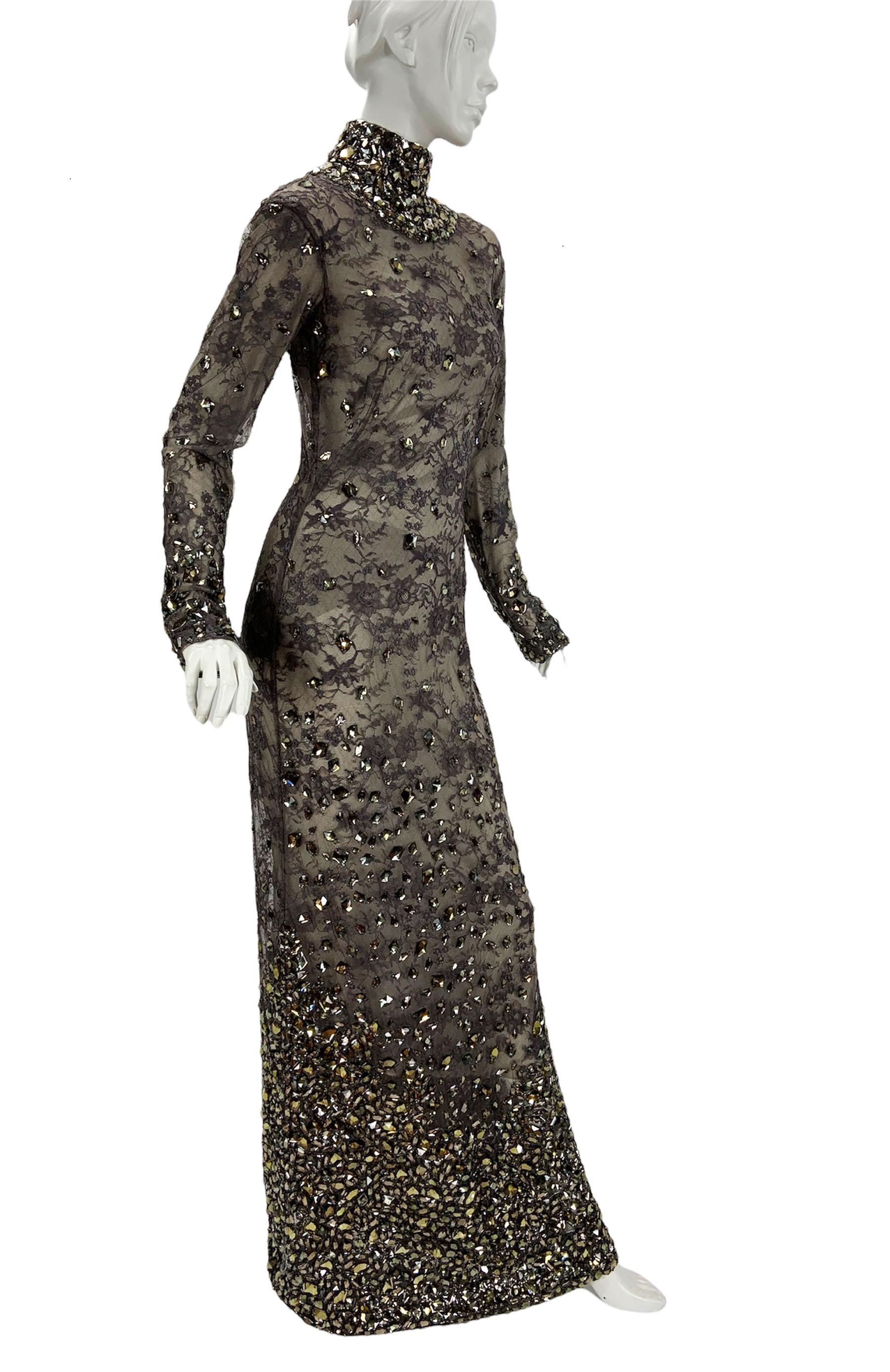 New Tom Ford *Broken Mirror* Lace Faceted Crystal Embellished Dress Gown
Tom Ford's First Womenswear Collection for his Eponimous Label Debuted in 2011.
Italian size 42
Smokey Gray Floral Lace Finished with Soft Yellow Crystals, Fully Lined in Silk,