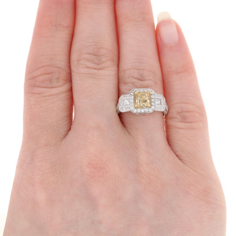 The quintessential blend of elegance and style, this ring is the perfect way to celebrate a special birthday or milestone anniversary.  Composed of high purity 18k white gold, this NEW piece features a fancy yellow diamond solitaire held in a