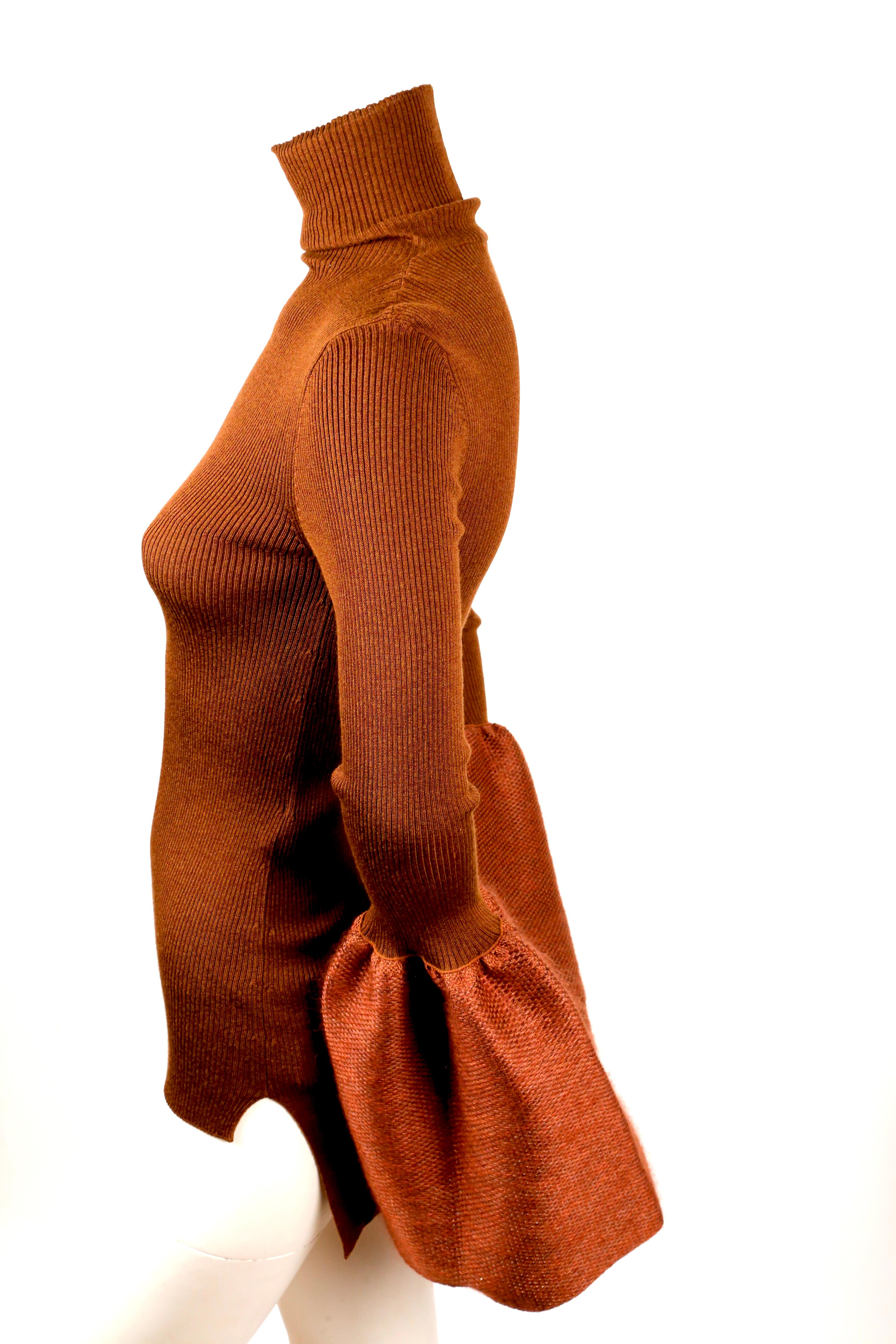 Brown silk and cashmere turtleneck with large bell sleeves designed by Phoebe Philo for Celine as seen on the fall 2015 runway. Size S. Approximate measurements (unstretched): shoulder 12