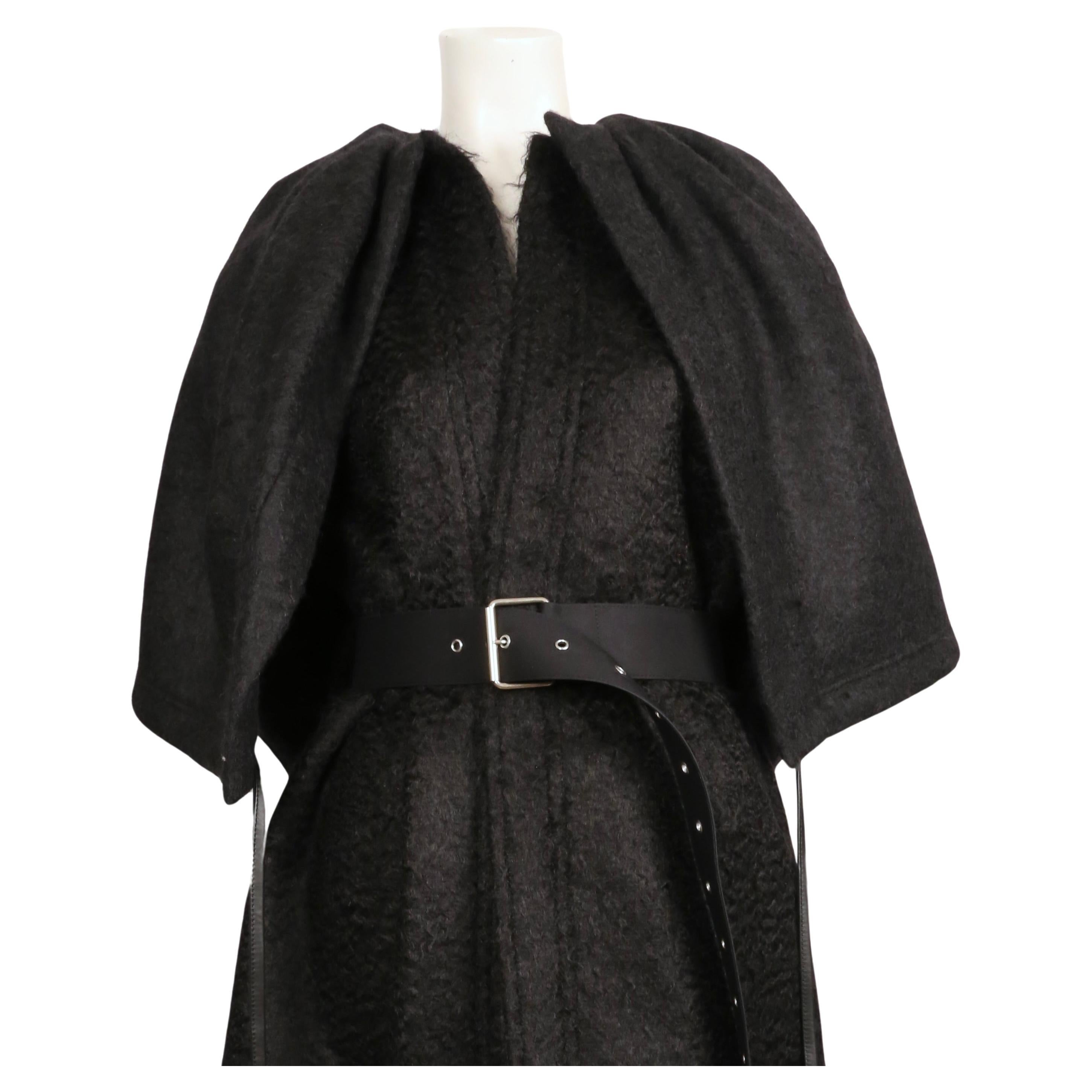 Very rare, Jet-black, fuzzy mohair wool coat with attached capelet and extra long belt designed by Phoebe Philo for Celine exactly as seen on the final runway look for fall of 2016.  French size 38. Approximate measurements: dropped shoulder 18