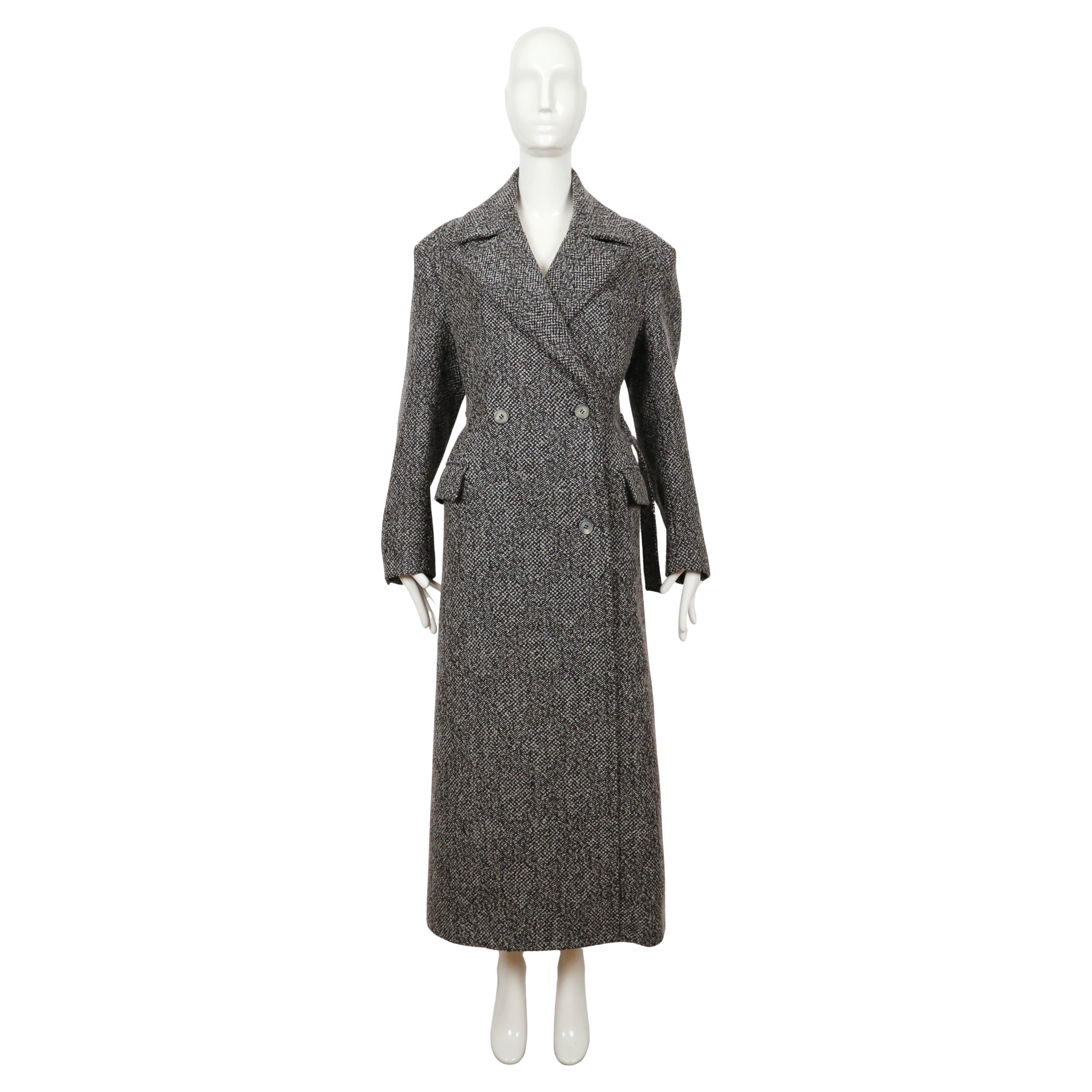 Full length, oversized, charcoal-grey, boucle wool coat with extra long half belt designed by Phoebe Philo for Celine dating to fall of 2018 collection.  French size 38. Approximate measurements (as currently belted can go 2-3