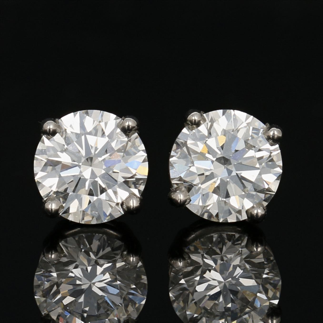 With the gift of diamonds, you can say it all without saying a word! Crafted in 950 platinum, these luxurious NEW stud earrings feature GIA-graded natural diamonds held in four-prong basket mounts to illuminate each gemstone’s spectacular