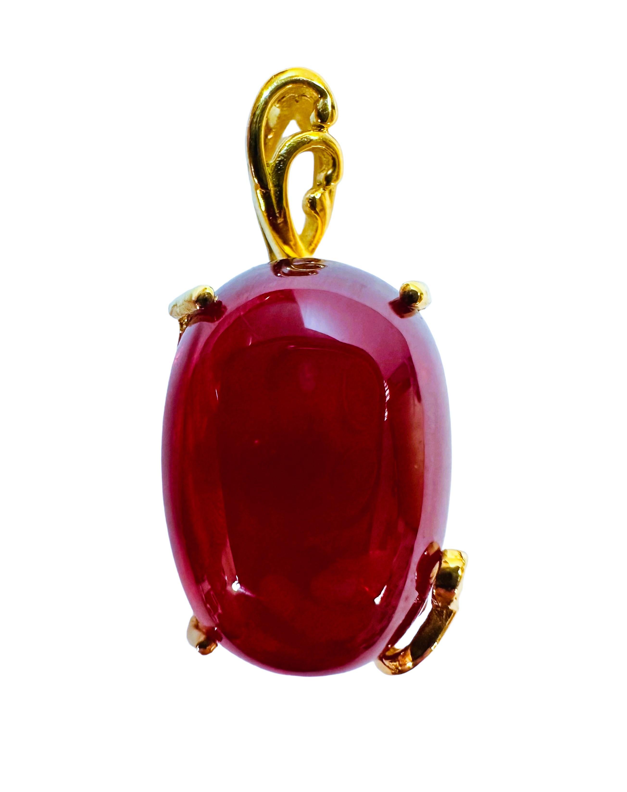 This pendant is just beautiful!  The stone is from Madagascar and is a large oval cabochon.  It is just exquisite. It is a very high quality stones. The stone is 23.10 cts.  It measures 18.5 x 12.7 mm.   The pendant is 1.13 inches long and .5 inches