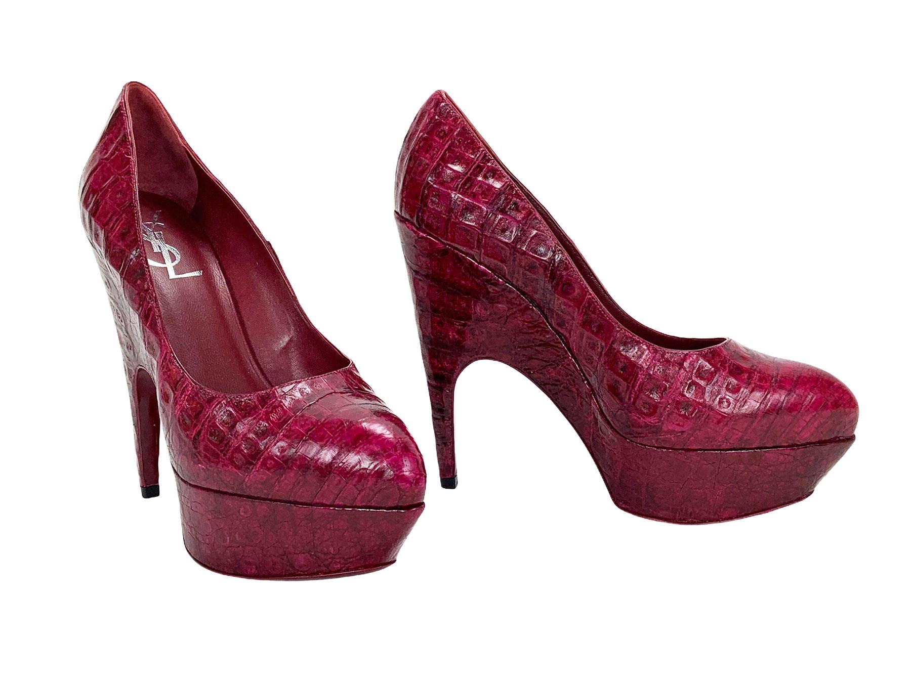 New Yves Saint Laurent Genuine Alligator Platform Shoes
Designer size 38.5 - US 8.5
Raspberry Color
Platform Height - 1.5 inches
Heel Height - 5.5 inches
Padded Leather Insole, Leather Sole.
Made in Italy
Retail $2590.00
New without box.