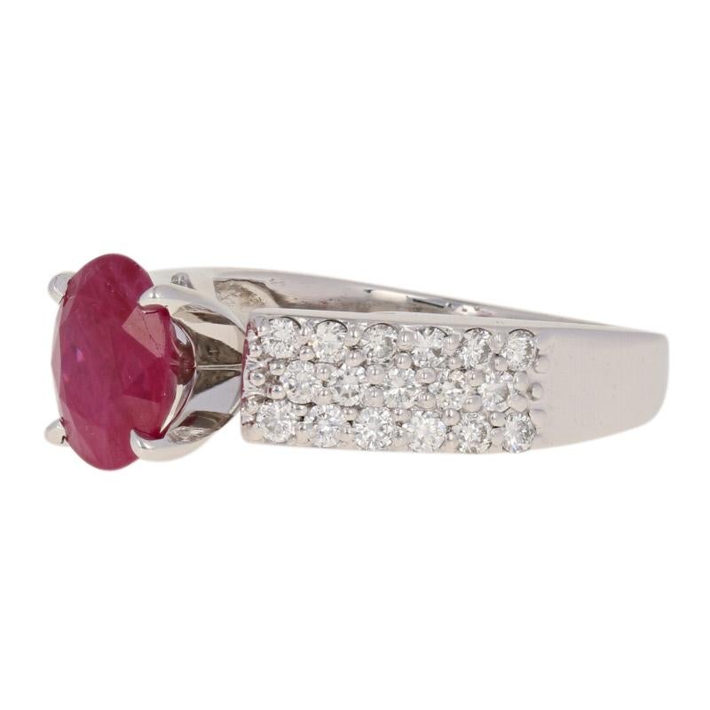 The bride who dreams of something unique will be enchanted with this engagement ring! Fashioned in popular 14k white gold, this stunning NEW piece features a 2.19ct ruby solitaire, which is likely a Mong Hsu Burmese ruby, that is displayed in a