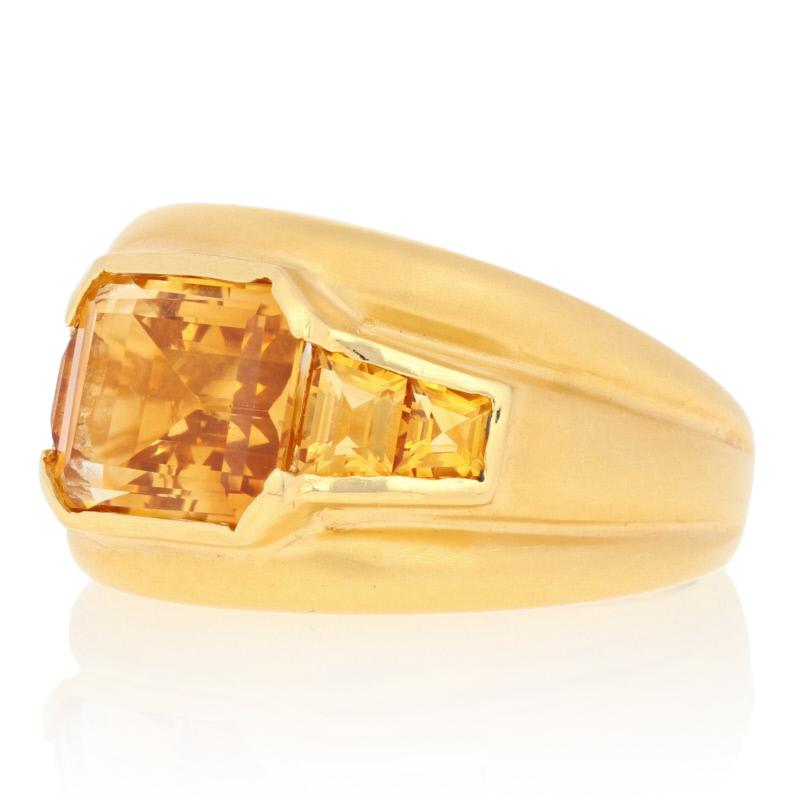 This ring is a size 6 1/2 - 6 3/4.

Metal Content: Guaranteed 18k Gold as stamped

Stone Information: 
Genuine Citrines
Treatment: Heating  
Color: Golden Yellow  
Total Carats: 3.70ctw 

Style: Solitaire with Accents
Face Height (north to south):