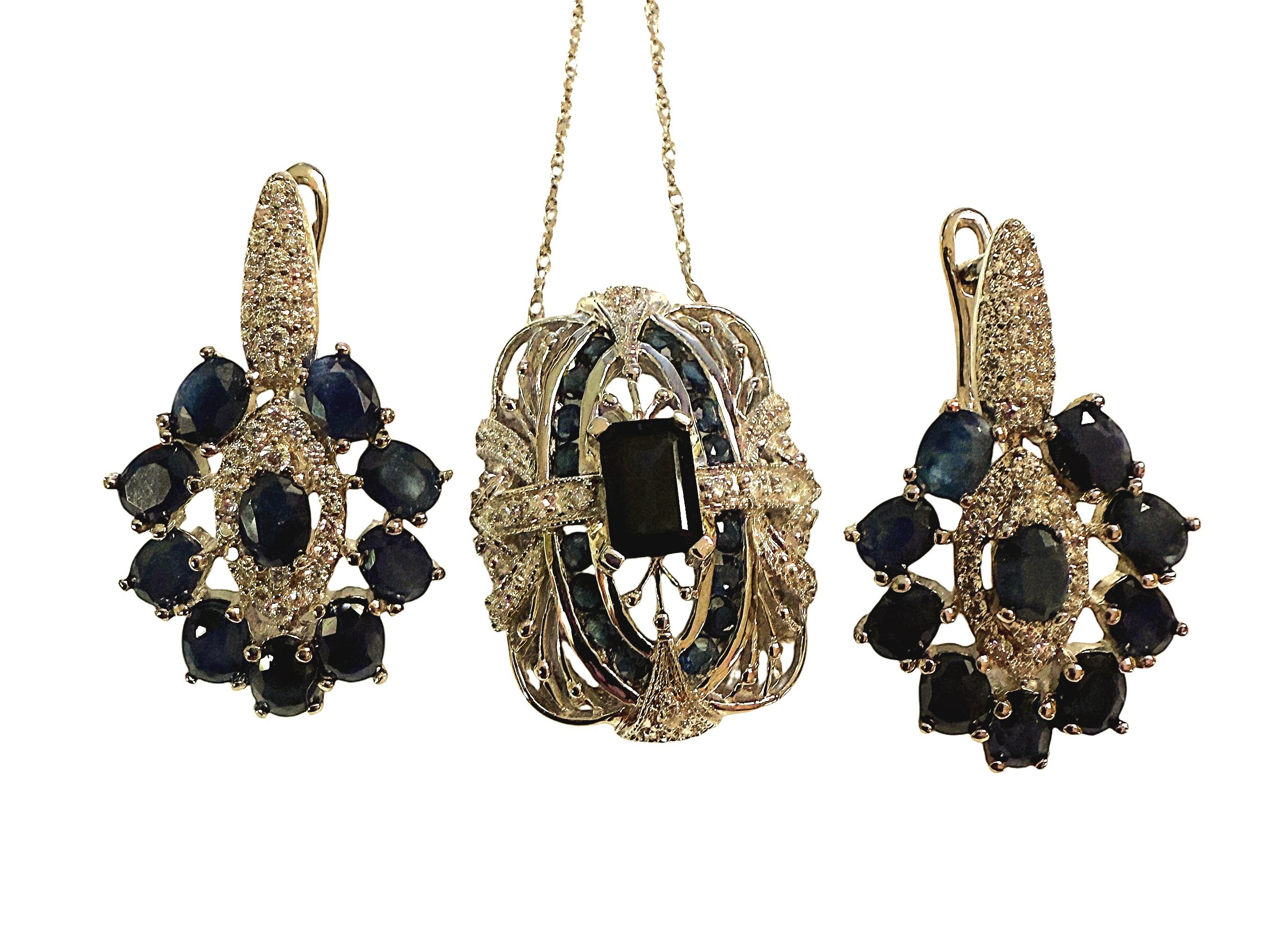 These earrings are just beautiful.  They have 10 oval sapphires measuring 3 x 2 mm on each earring.  Each earring totals 2.15 carats.  They have in inner circle of  diamond cut white and they also run up the bail of the earrings.  They have a french
