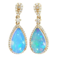 New 4.38ctw Ethiopian Opal 
0.62ctw Diamond Frame Dangle Earrings in 14K Gold