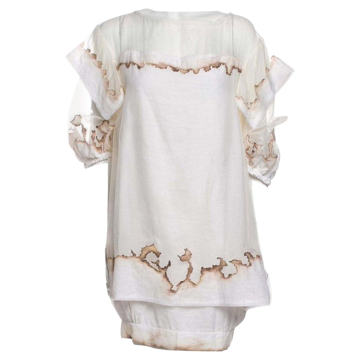 Fendi Karl Lagerfeld
Brand New W/ Tags
S/S 2011
Oversized Size IT 38 
* Retail $4400
* See Karl Lagerfeld Hand drawn Sketch for this Collection
By Hand Controlled Burned Edging
*Three Quarter Sleeves with Ties
* Button Accent at Back of Neck

Bust: