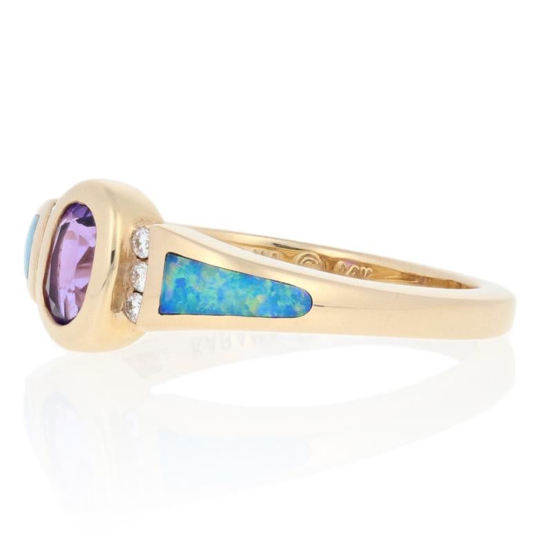 Pure enchantment! Fashioned in classic 14k yellow gold, this beautiful NEW Kabana ring features a royal-purple amethyst solitaire bordered in crescents of diamonds. Inlaid opals add flames of blue-green fire to the sides of the band as they merge