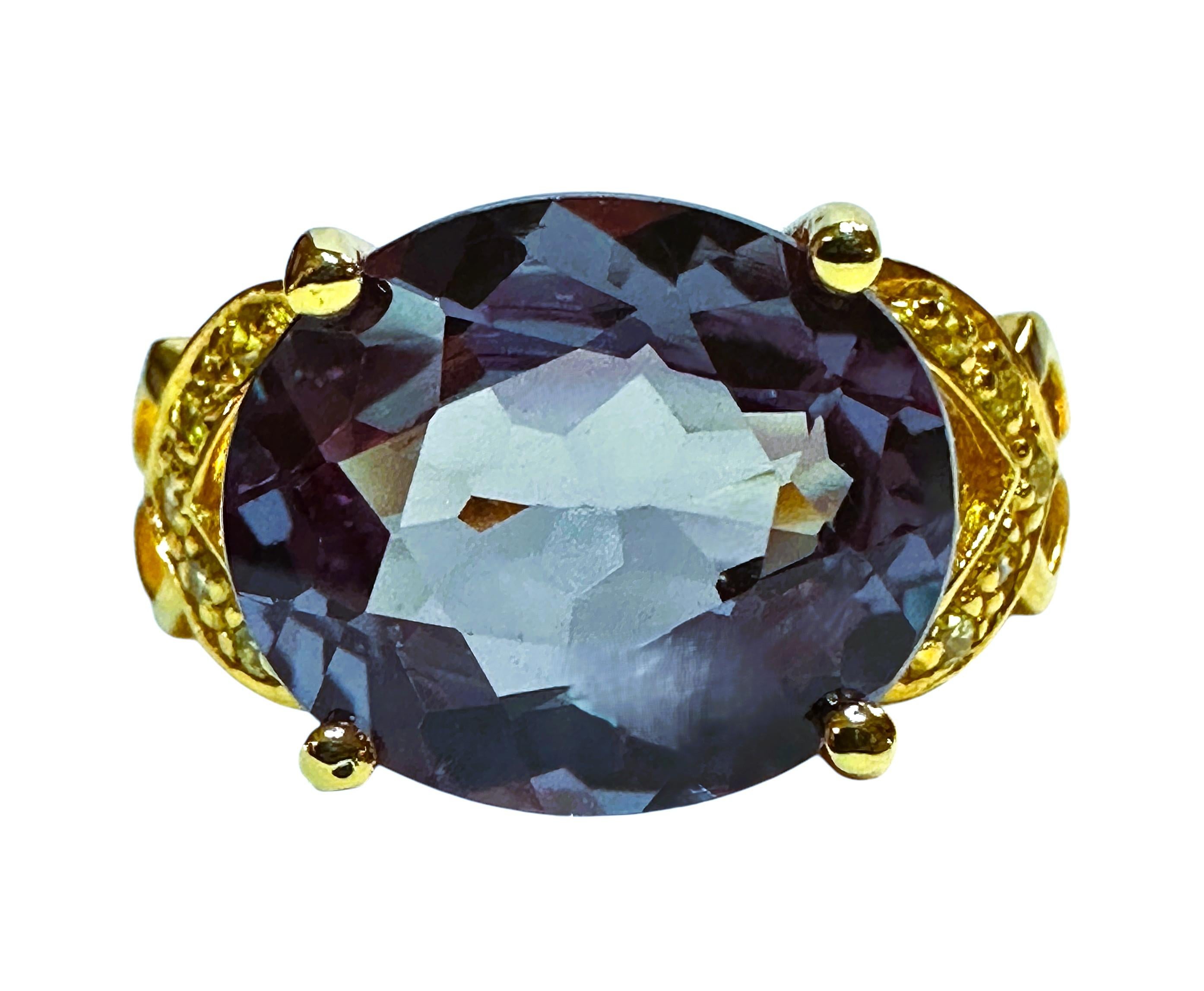 The ring is a size 6.75. The stone is from Sri Lanka. It is a beautiful oval cut stone and is 5.25 cts.  It is a very high quality stone.  It measures 12.2 x 10.3  mm and and is flanked by diamond cut white sapphires on the split band.  They are all