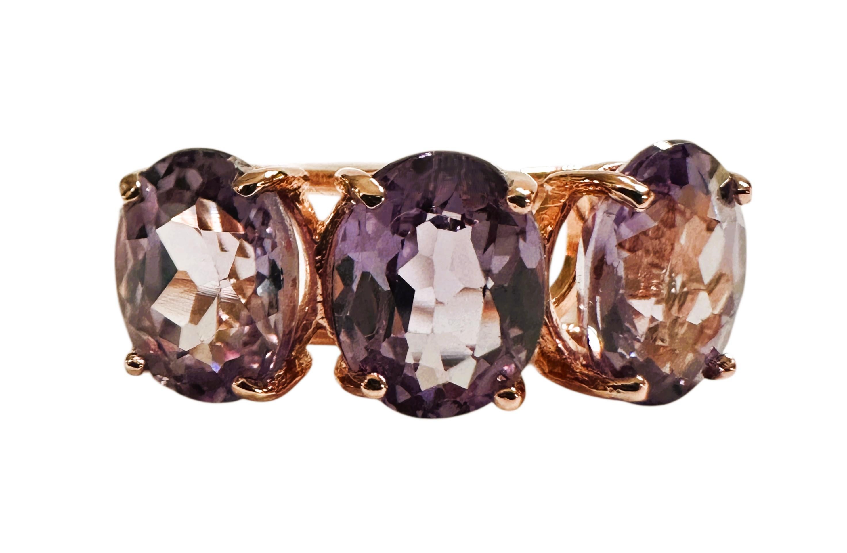 This ring is just gorgeous.  It has 3 color-changing Alexandrite stones. The ring is a size 6.5.  The stones are from Tanzania and are just exquisite. They will change color between purple and blue depending on what you are wearing.  The stones are