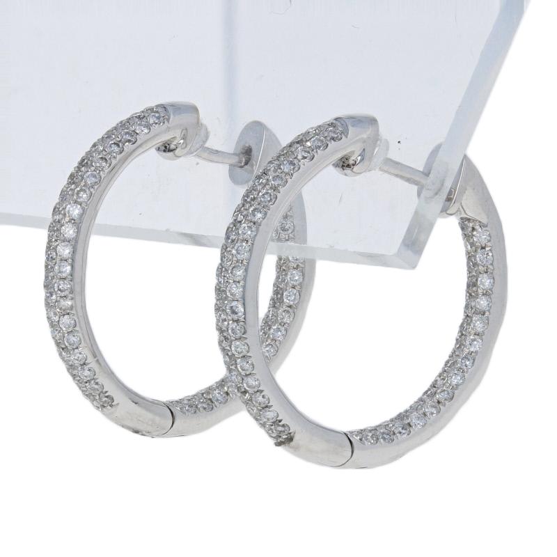 Metal Content: Guaranteed 18k Gold as stamped

Stone Information: 
Natural Diamonds  
Clarity: VS2 
Color: G  
Cut: Round Brilliant
Total Carats: 0.58ctw 

Style: Inside-Out Hoop
Fastening Type: Snap Closures
Measurements: Tall: 25/32