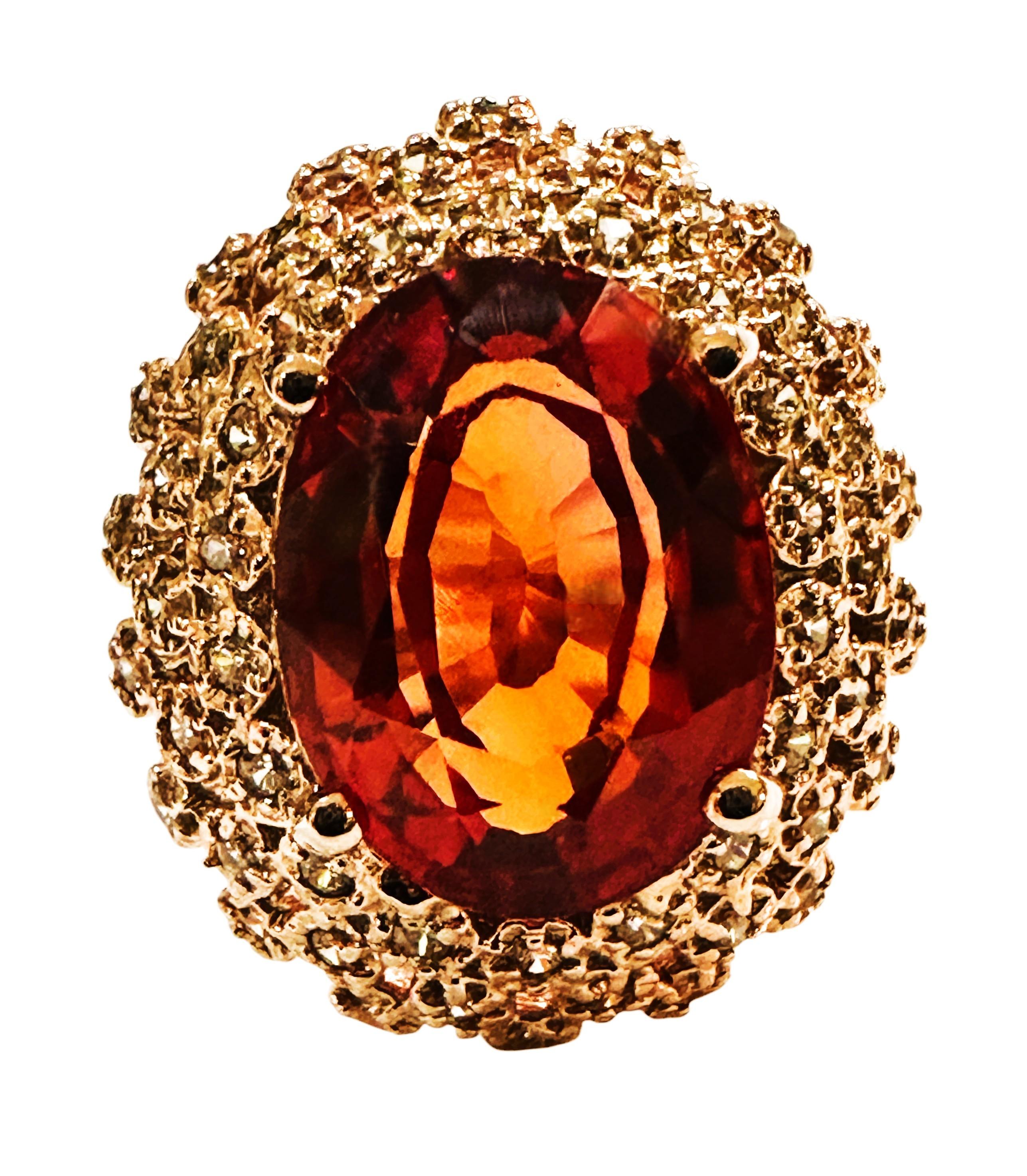 This is an amazing ring.  The ring is a size 6.75. The stone is from Africa.  It is a beautiful oval cut stone and is 7.2 cts.  It is a very high quality stone.  It measures 12.8 x 10 mm and and is surrounded by this beautiful  6 mm open work bib