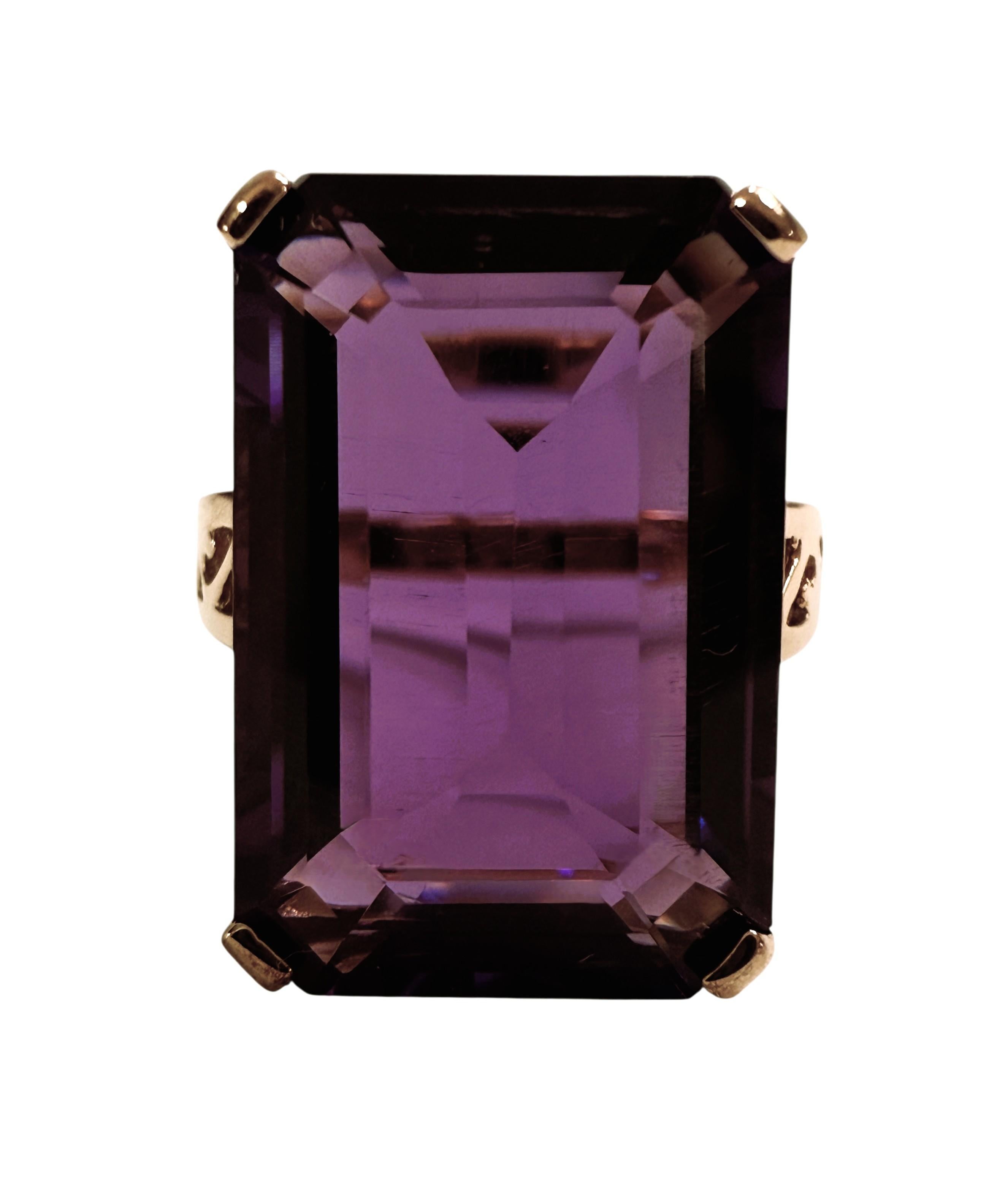 What a gorgeous ring.  The ring is a size 6.25.  The stone is from Brazil.   It is a beautiful Emerald cut stone and is 7.90 carats.  It is a very high quality stone.  It measures 20 x 13.3 mm and is set in a gorgeous Rose Gold Plated Sterling