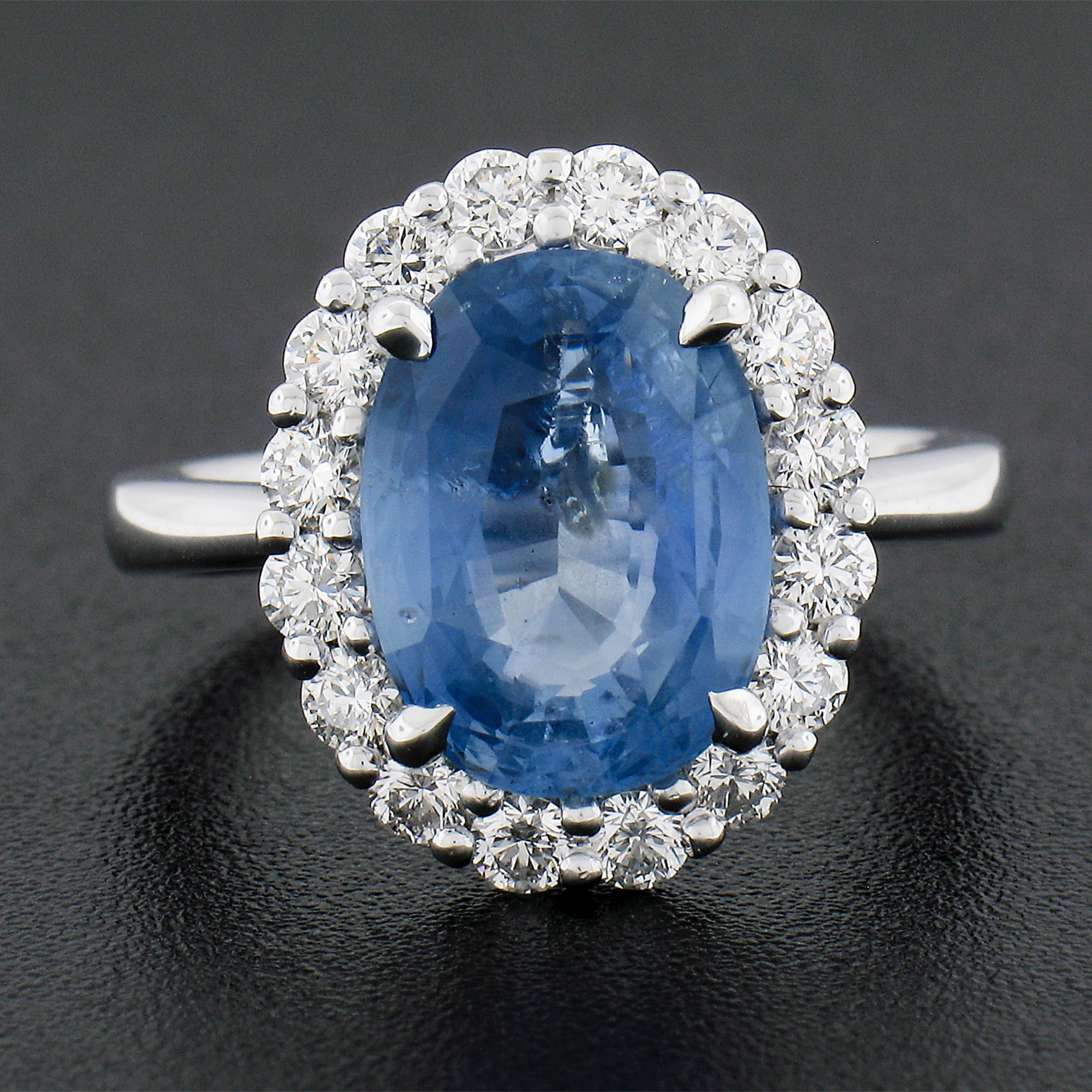 Oval Cut New .900 Platinum 6.28ctw GIA Oval Blue Sapphire & Round Diamond Halo Ring For Sale