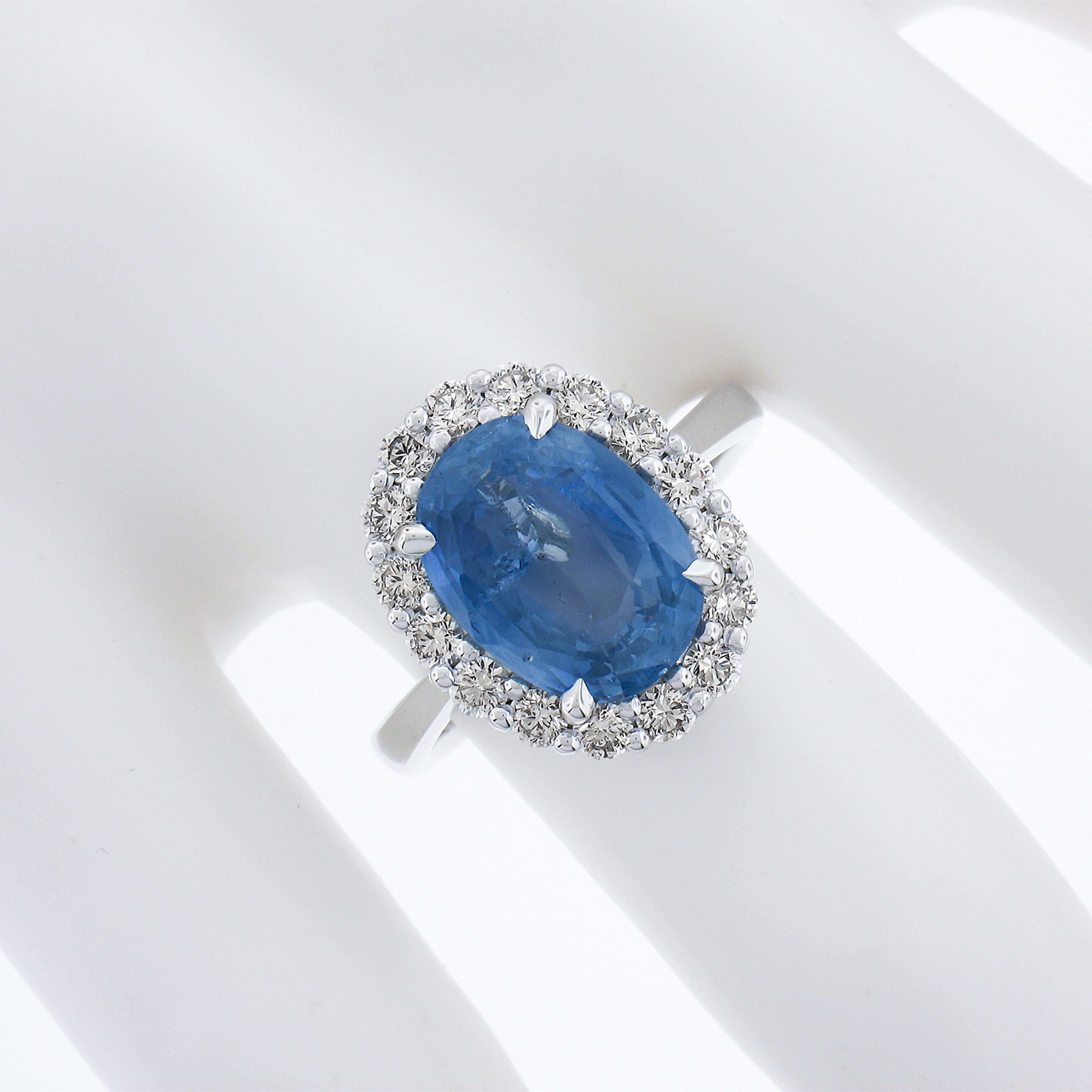 New .900 Platinum 6.28ctw GIA Oval Blue Sapphire & Round Diamond Halo Ring In New Condition For Sale In Montclair, NJ