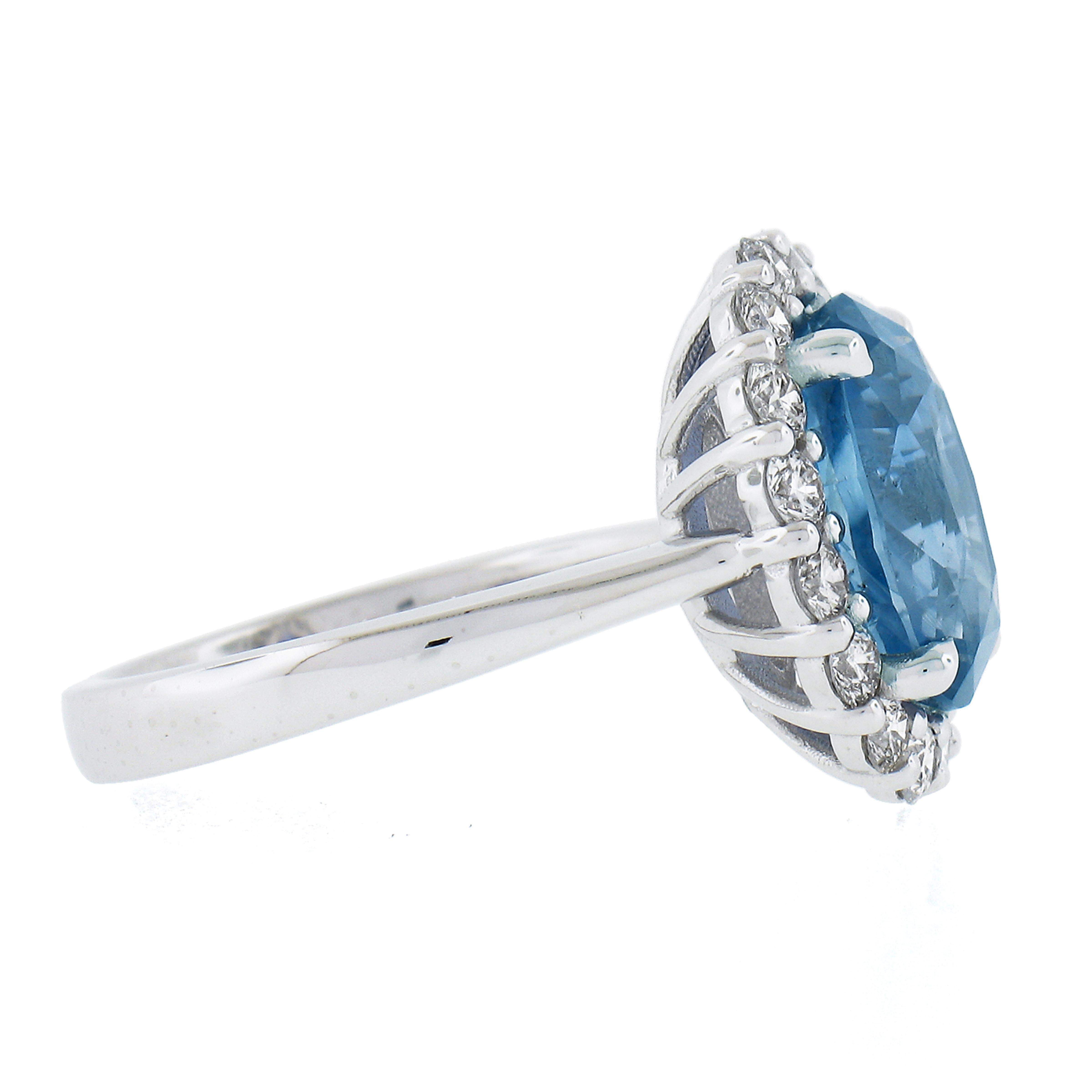 Women's New .900 Platinum 6.28ctw GIA Oval Blue Sapphire & Round Diamond Halo Ring For Sale