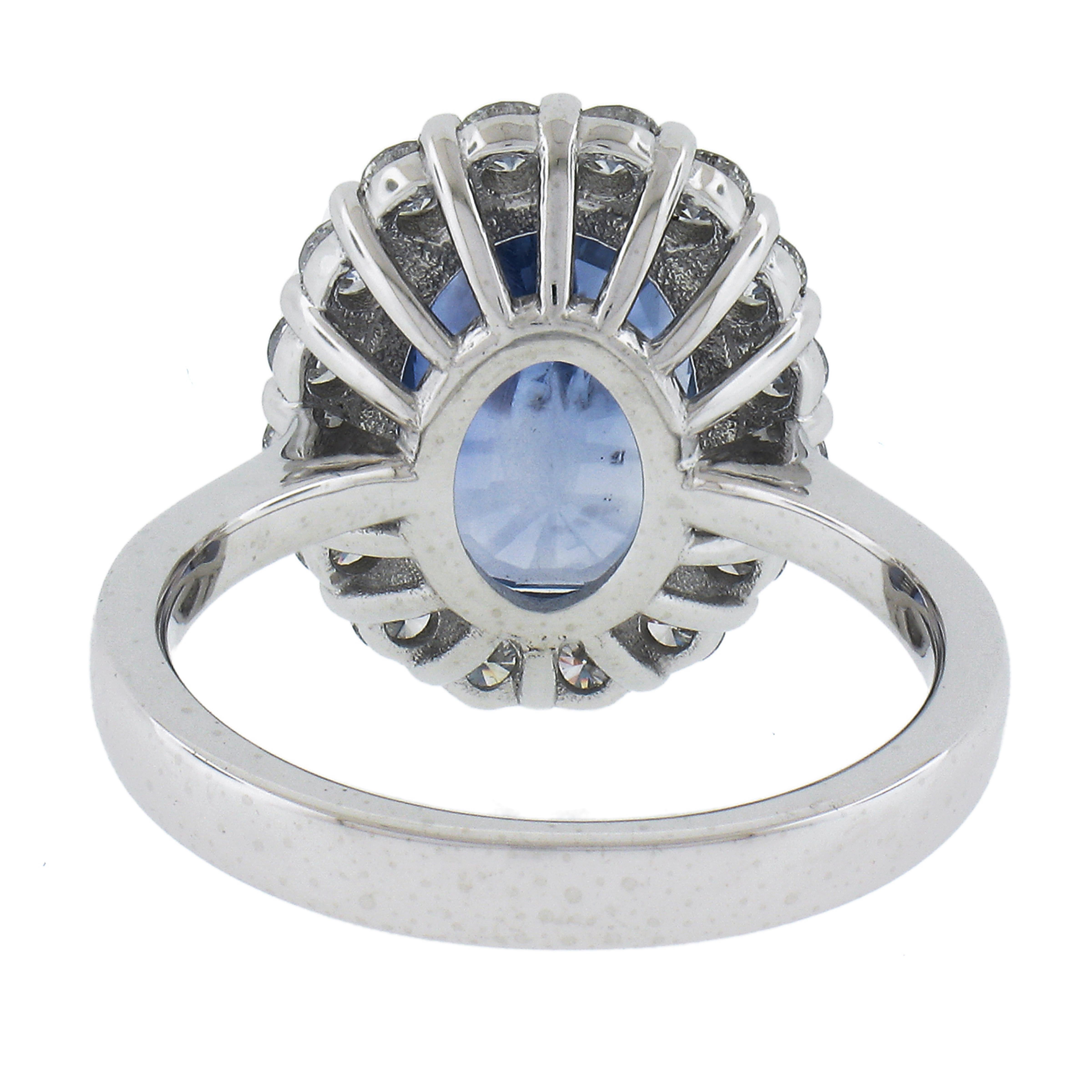 New .900 Platinum 6.28ctw GIA Oval Blue Sapphire & Round Diamond Halo Ring For Sale 2