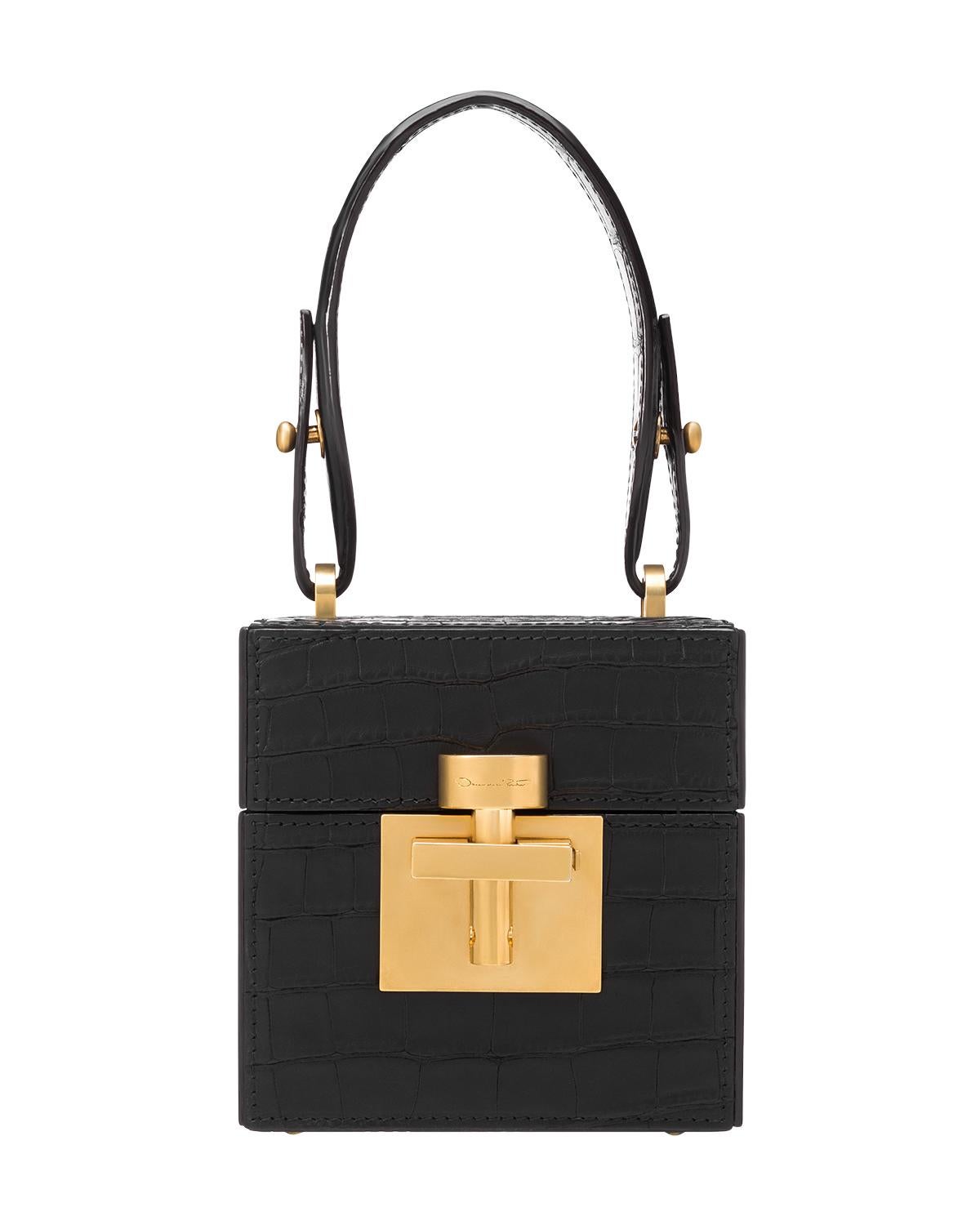 Oscar De La Renta
Brand New with Box & Tags
$9690
* Absolutely Stunning!
Black Genuine Alligator
Antiqued Gold-Tone Hardware
Flat Handle & Chain-Link Shoulder Strap
Suede Lining with Card Slot
Push-Lock Closure at Front

THE ALIBI CUBE IS CRAFTED