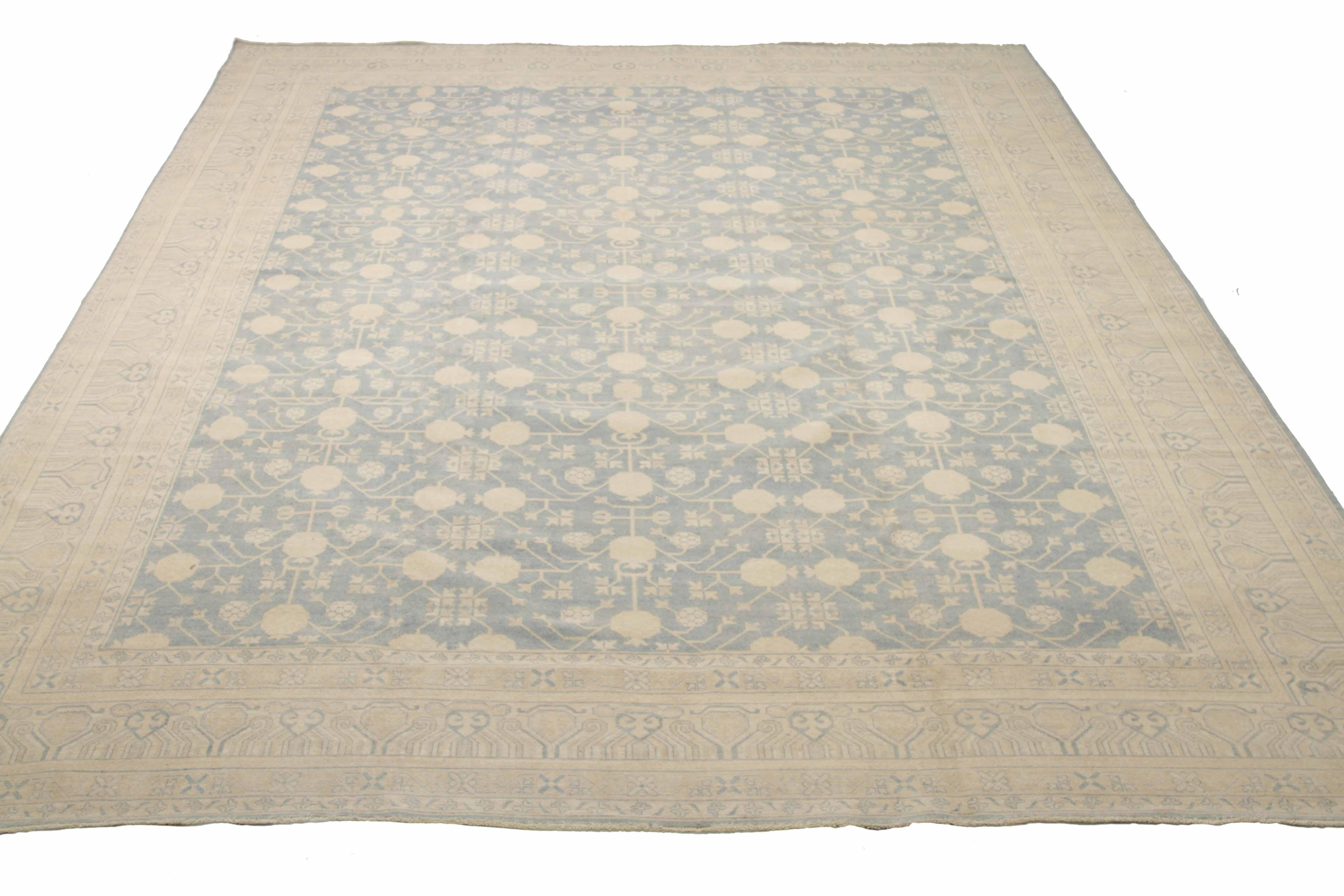 New area rug handwoven from the finest sheep’s wool. It’s colored with all-natural vegetable dyes that are safe for humans and pets. It’s a traditional Khotan design handwoven by expert artisans. It’s a lovely area rug that can be incorporated with