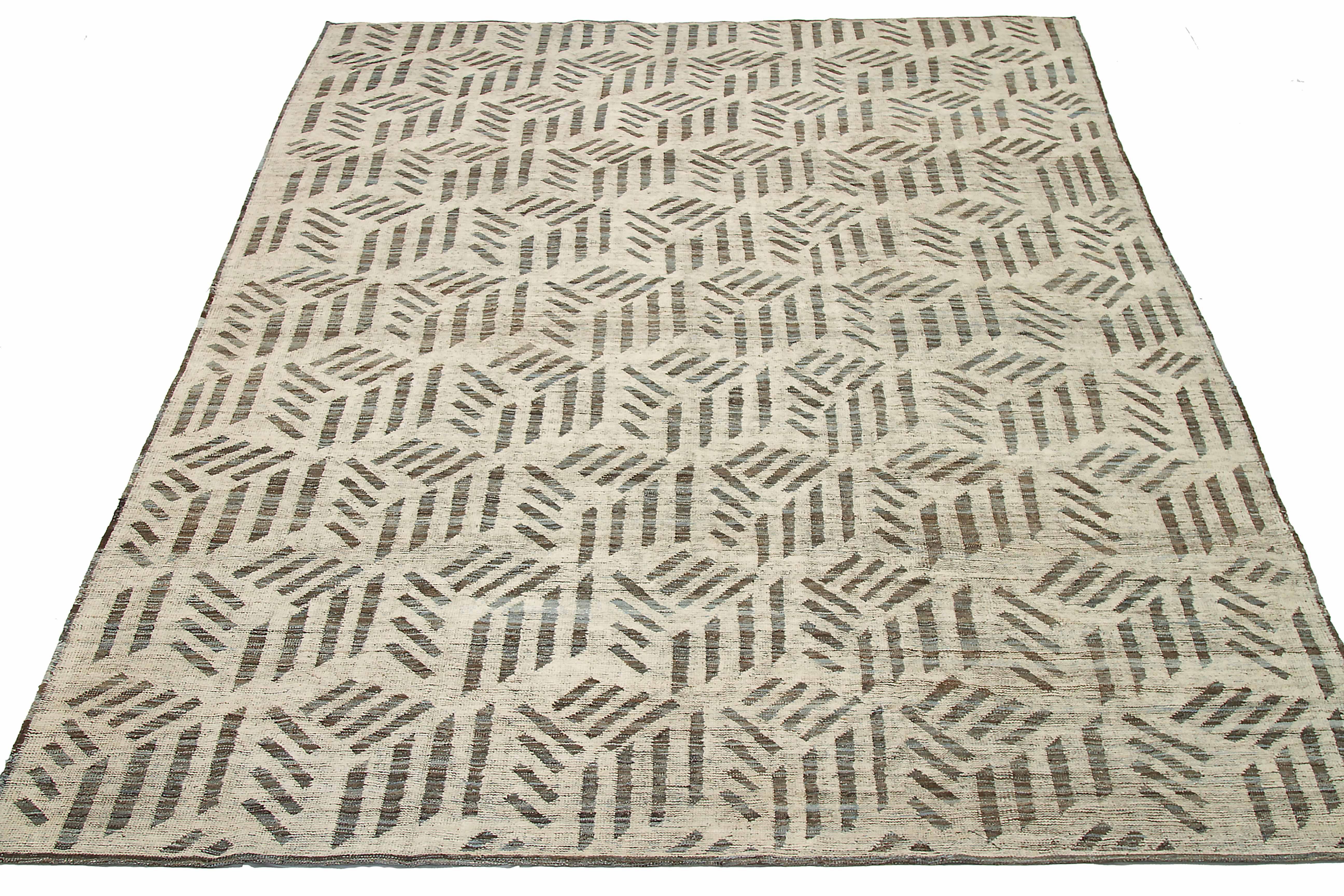 New Afghan area rug handwoven from the finest sheep’s wool. It’s colored with all-natural vegetable dyes that are safe for humans and pets. It’s a traditional Moroccan design handwoven by expert artisans. It’s a lovely area rug that can be