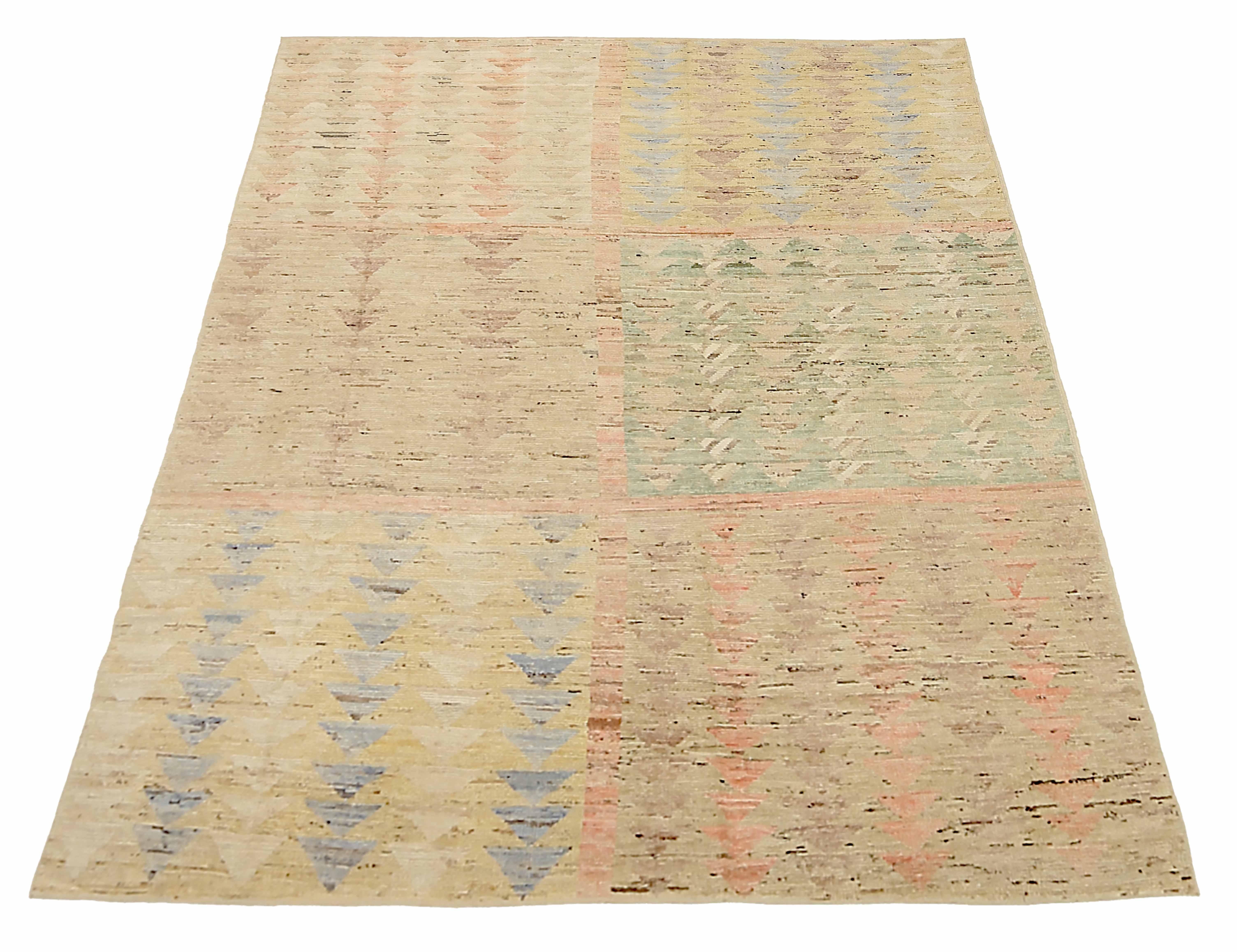 New Afghan area rug handwoven from the finest sheep’s wool. It’s colored with all-natural vegetable dyes that are safe for humans and pets. It’s a traditional Moroccan design handwoven by expert artisans. It’s a lovely area rug that can be