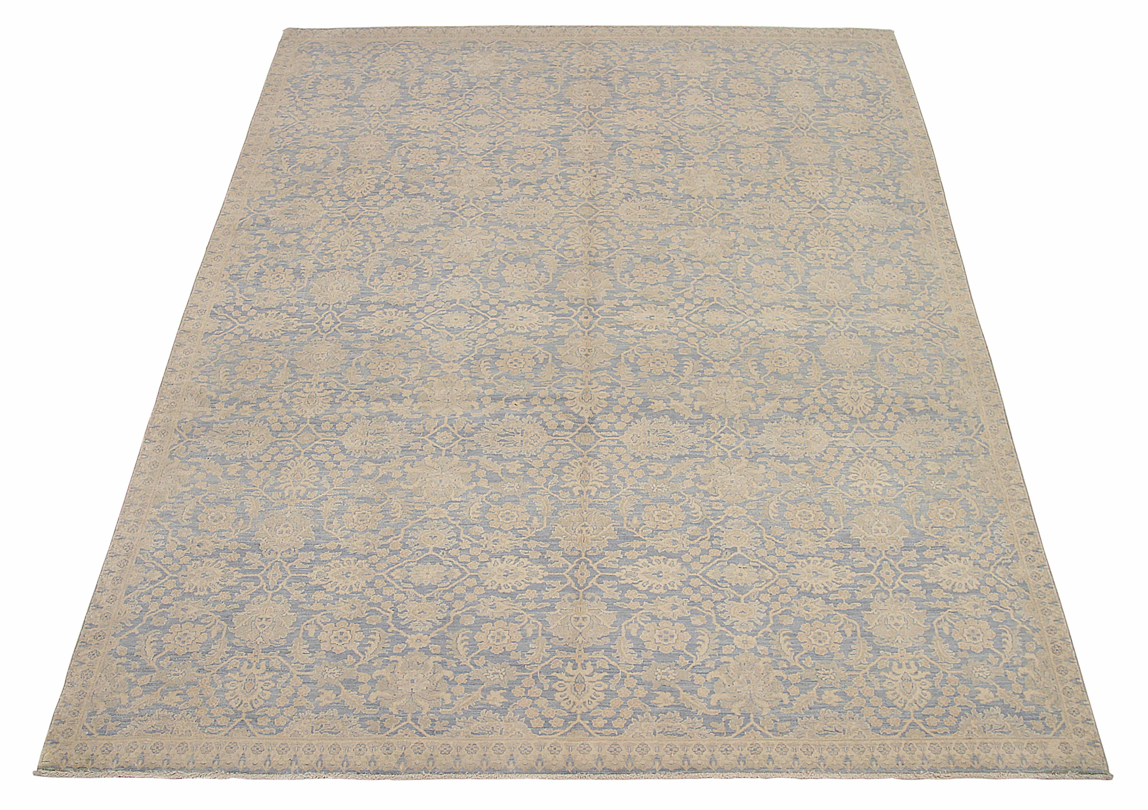 New Afghan area rug handwoven from the finest sheep’s wool. It’s colored with all-natural vegetable dyes that are safe for humans and pets. It’s a traditional Tabriz design handwoven by expert artisans. It’s a lovely area rug that can be